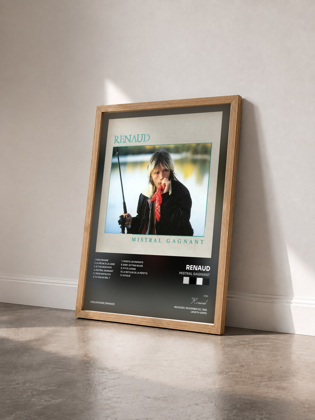 #bois Tableau de l'album Mistral gagnant de Renaud vu de trois quarts, cadre en bois brut