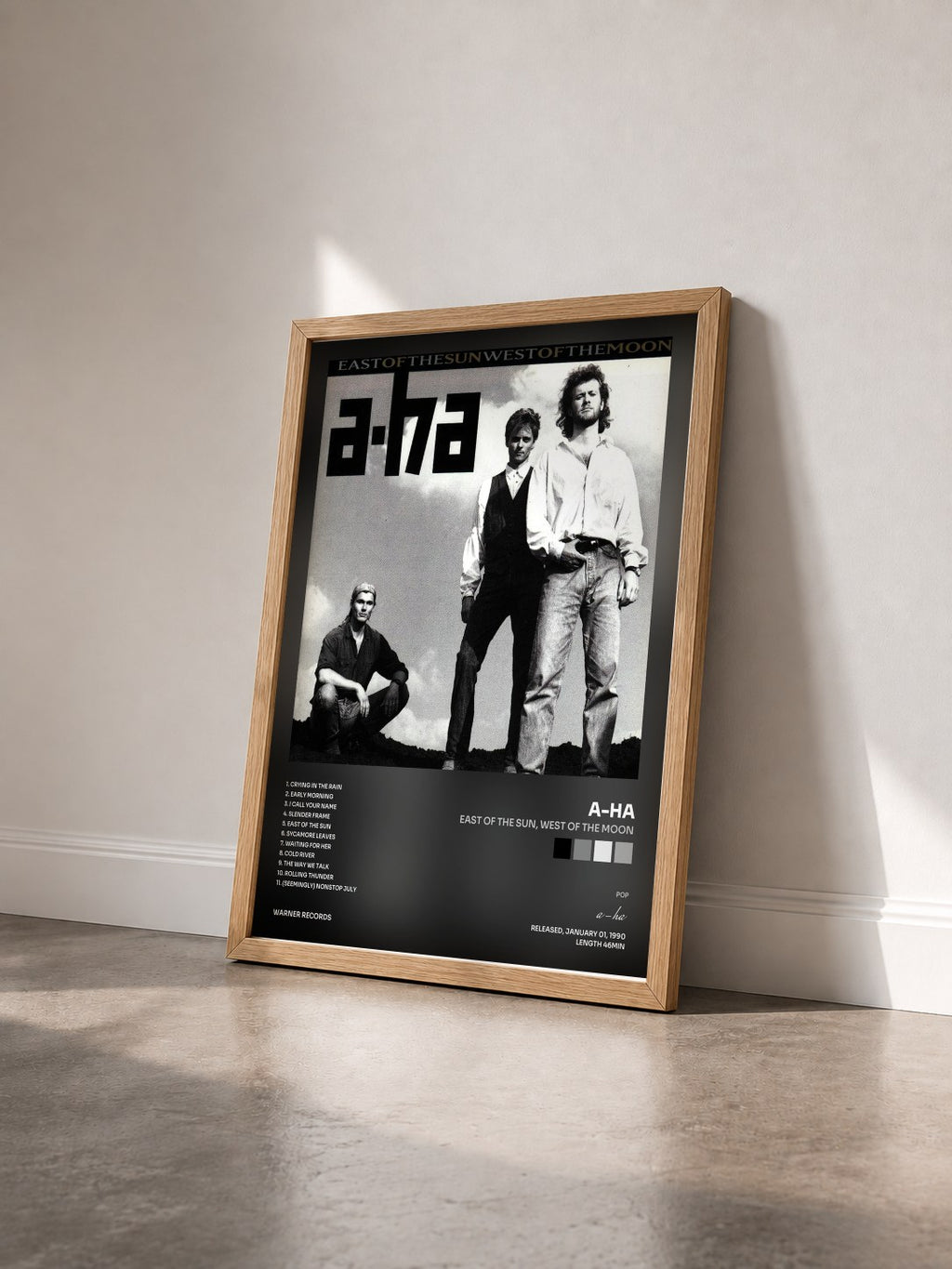 #bois Tableau de l'album East of the Sun, West of the Moon de a-ha vu de trois quarts, cadre en bois brut