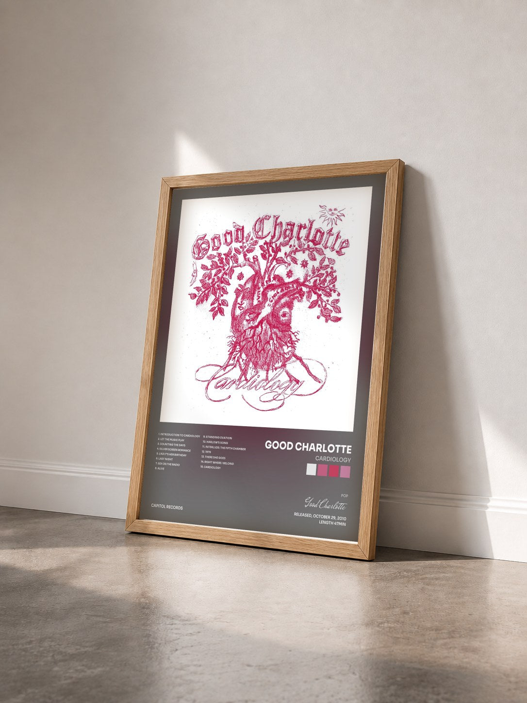 #bois Tableau de l'album Cardiology de Good Charlotte vu de trois quarts, cadre en bois brut