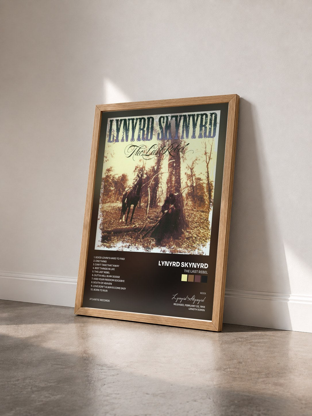 #bois Tableau de l'album The Last Rebel de Lynyrd Skynyrd vu de trois quarts, cadre en bois brut