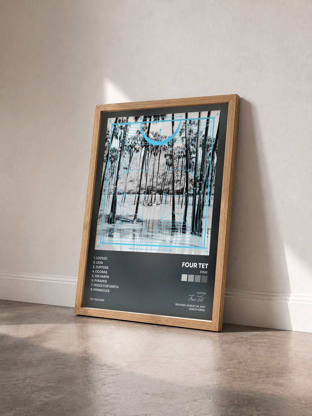 #bois Tableau de l'album Pink de Four Tet vu de trois quarts, cadre en bois brut