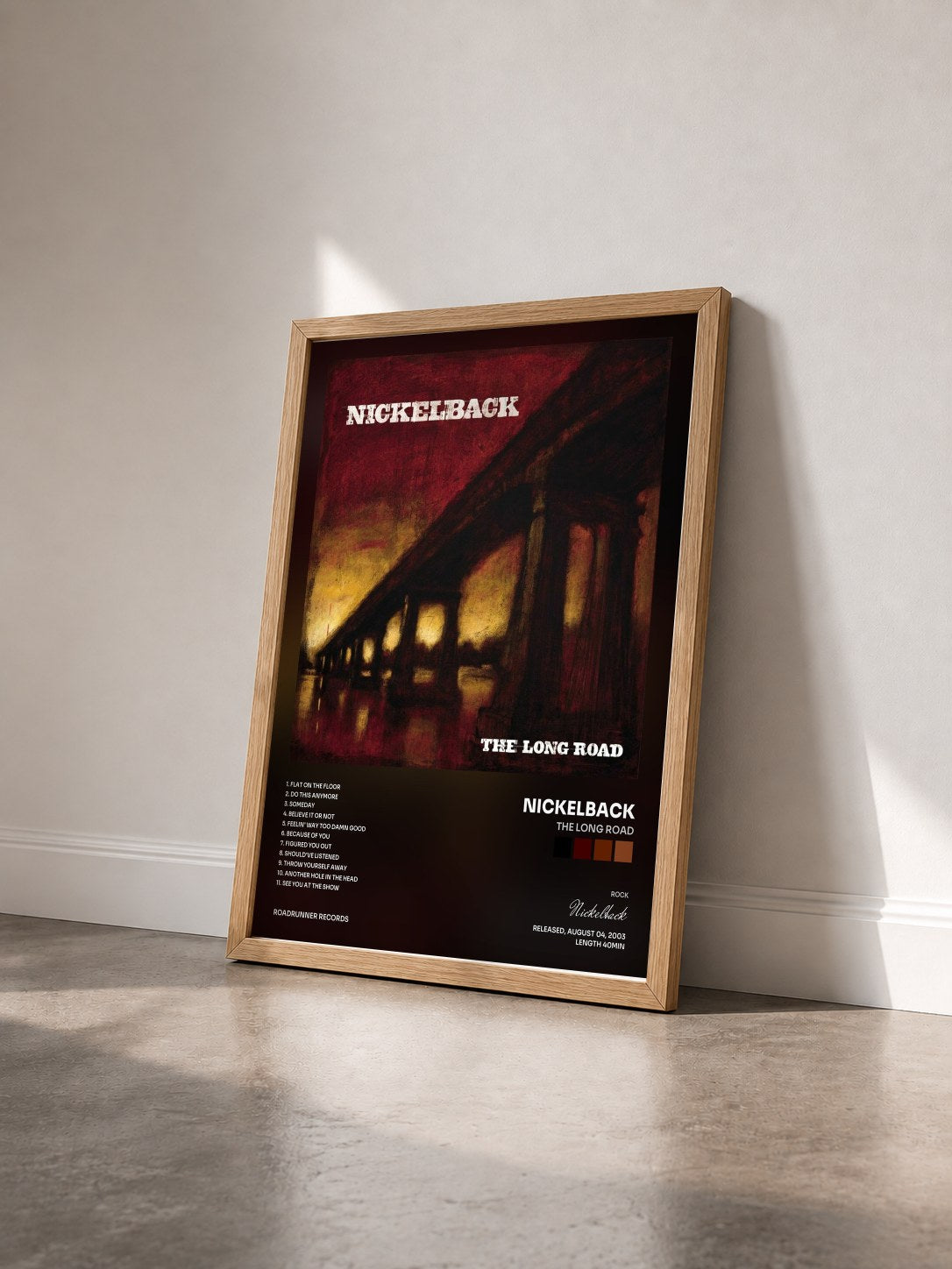 #bois Tableau de l'album The Long Road de Nickelback vu de trois quarts, cadre en bois brut