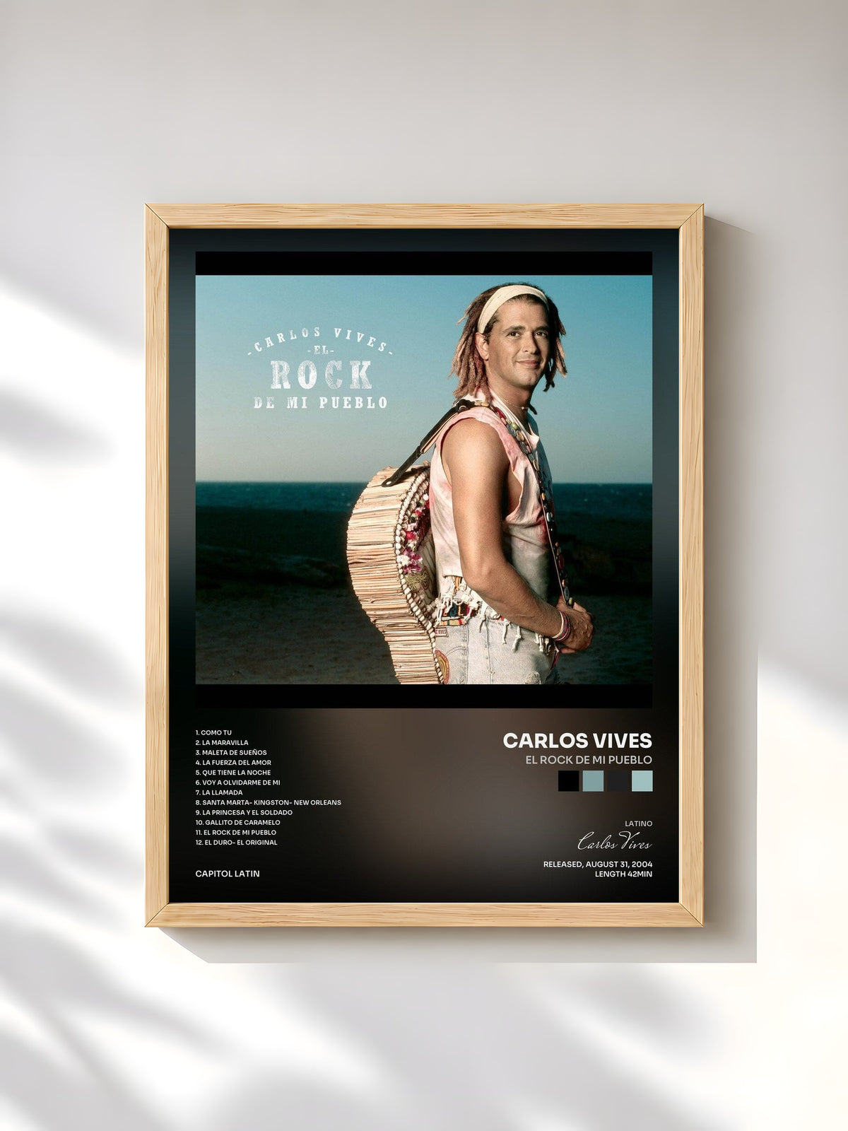 #bois Tableau de l'album El Rock De Mi Pueblo de Carlos Vives, cadre en bois brut, imprimé et encadré en France