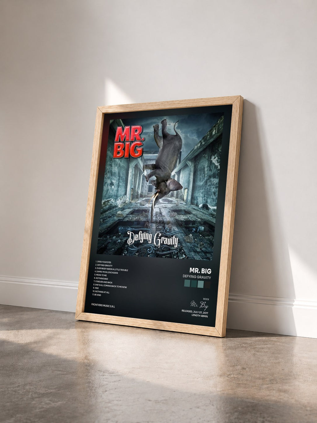 #bois Tableau de l'album Defying Gravity de Mr. Big vu de trois quarts, cadre en bois brut