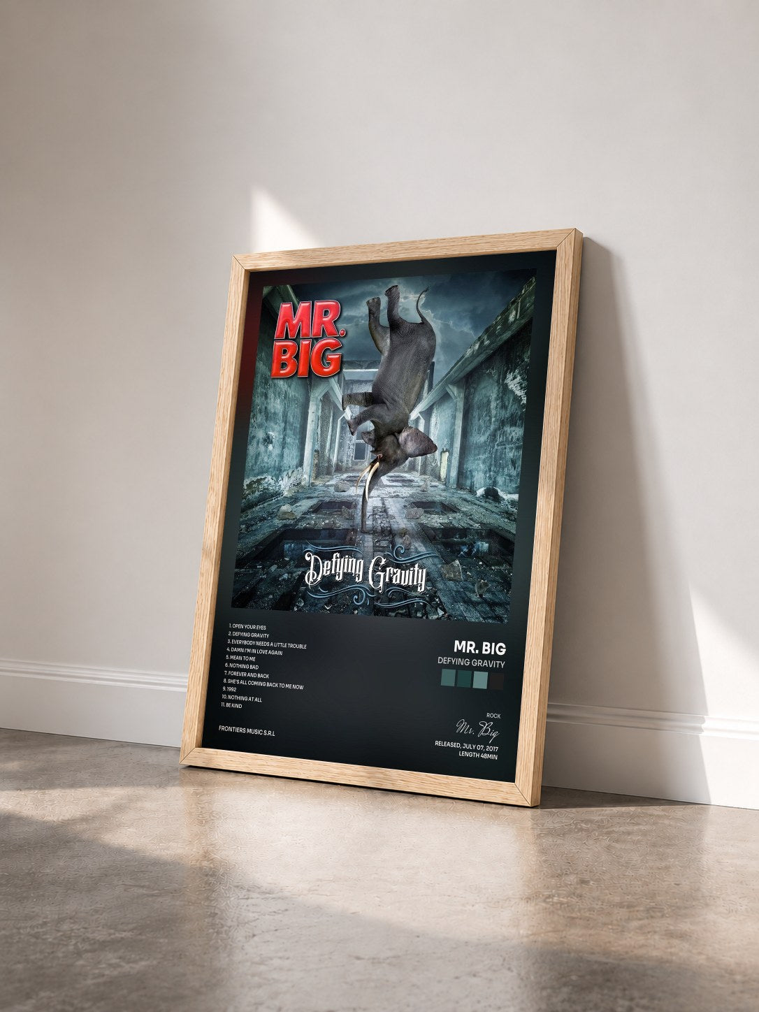 #bois Tableau de l'album Defying Gravity de Mr. Big vu de trois quarts, cadre en bois brut