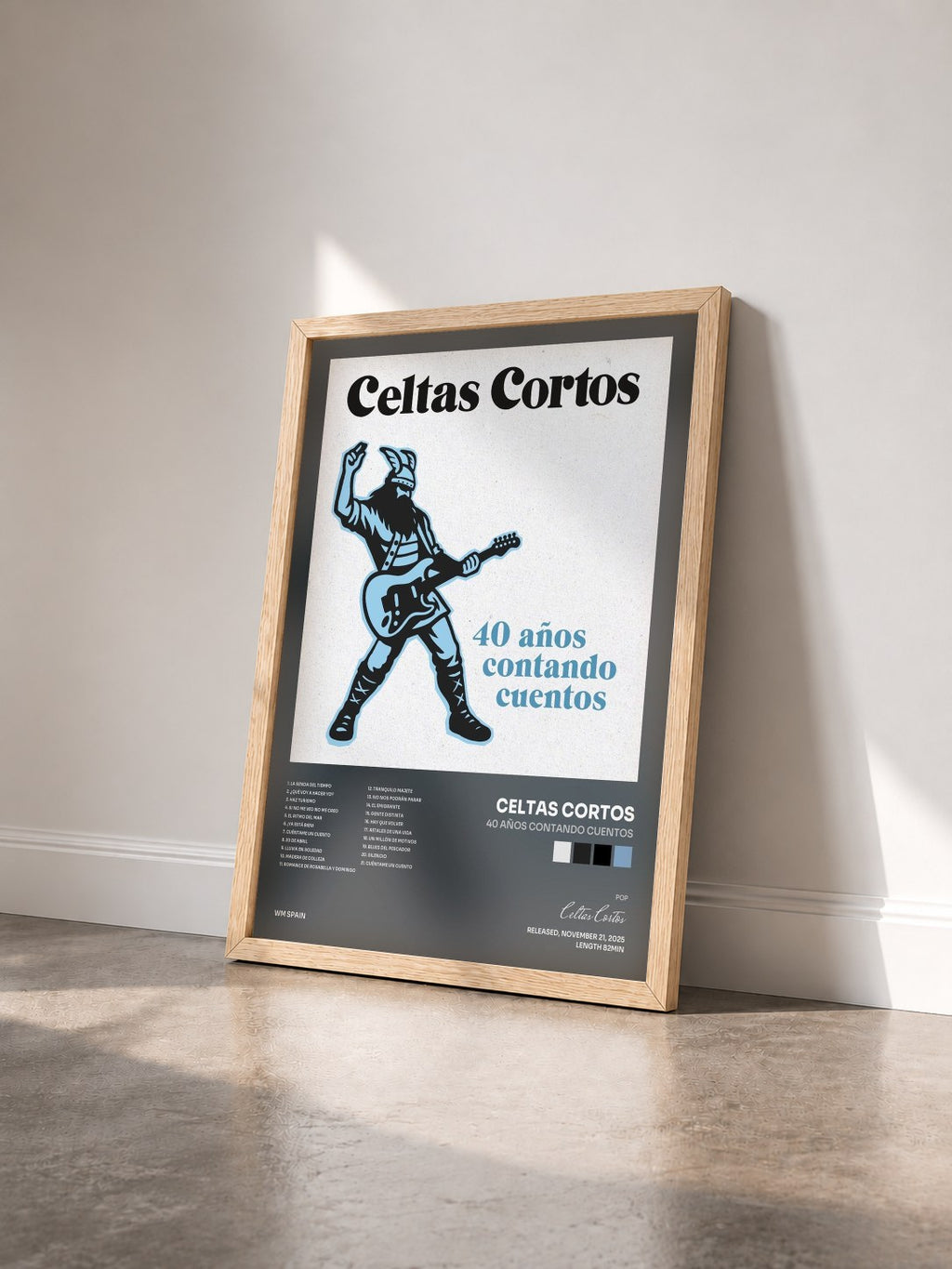 #bois Tableau de l'album 40 años contando cuentos de Celtas Cortos vu de trois quarts, cadre en bois brut