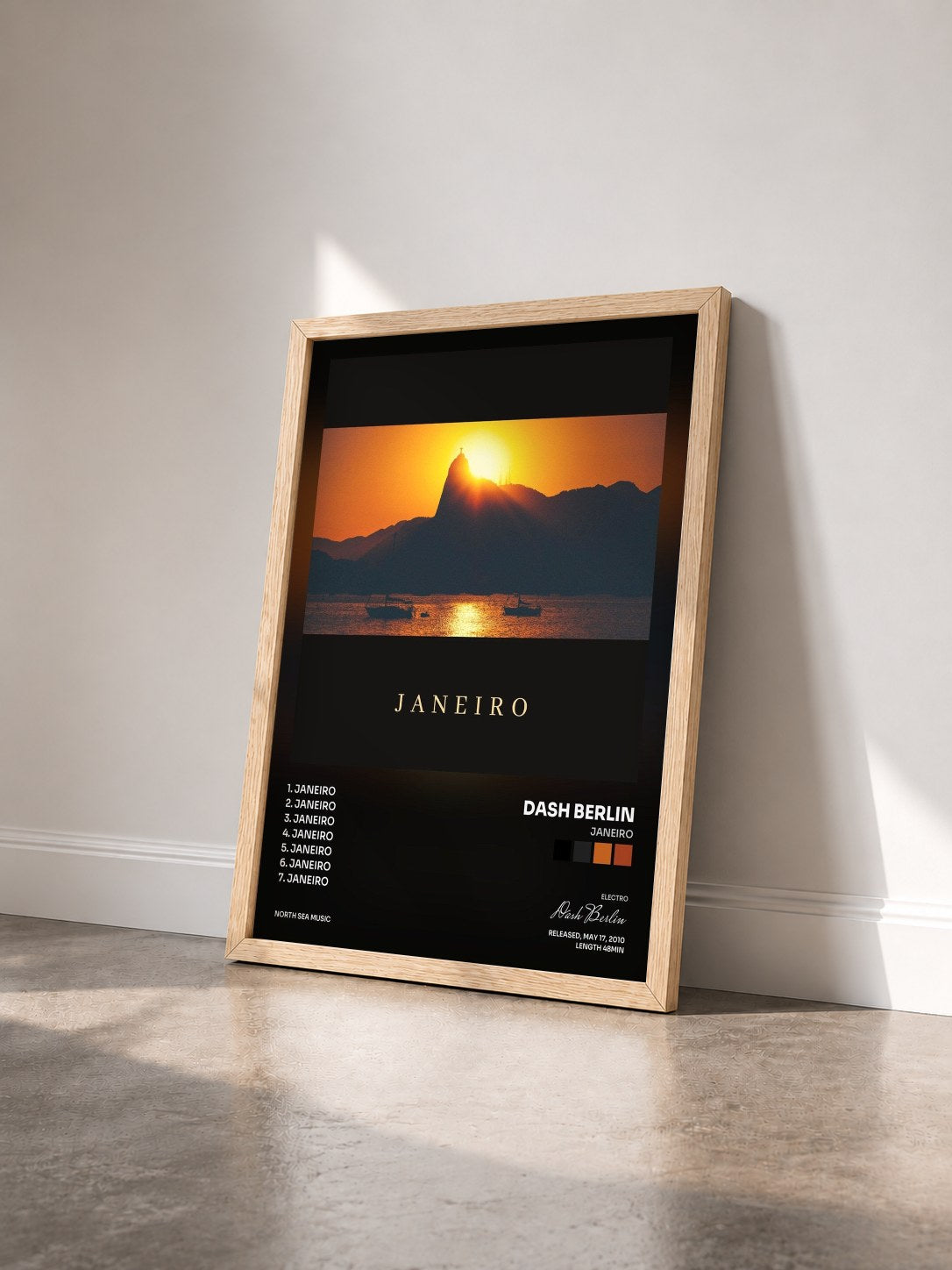#bois Tableau de l'album Janeiro de Dash Berlin vu de trois quarts, cadre en bois brut