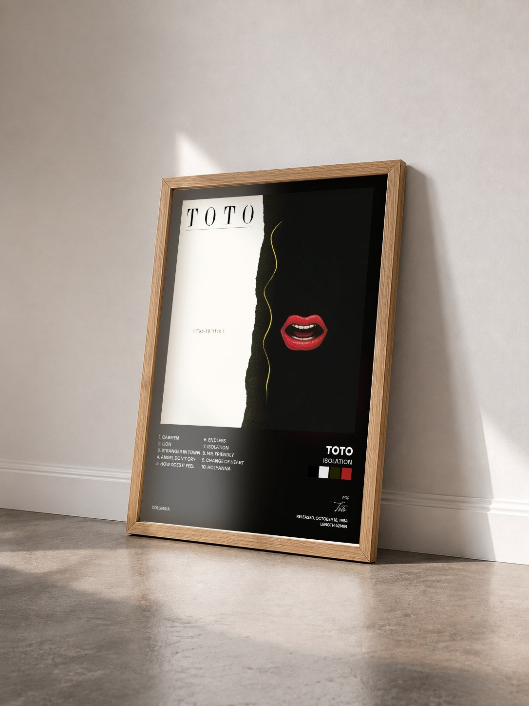 #bois Tableau de l'album Isolation de Toto vu de trois quarts, cadre en bois brut