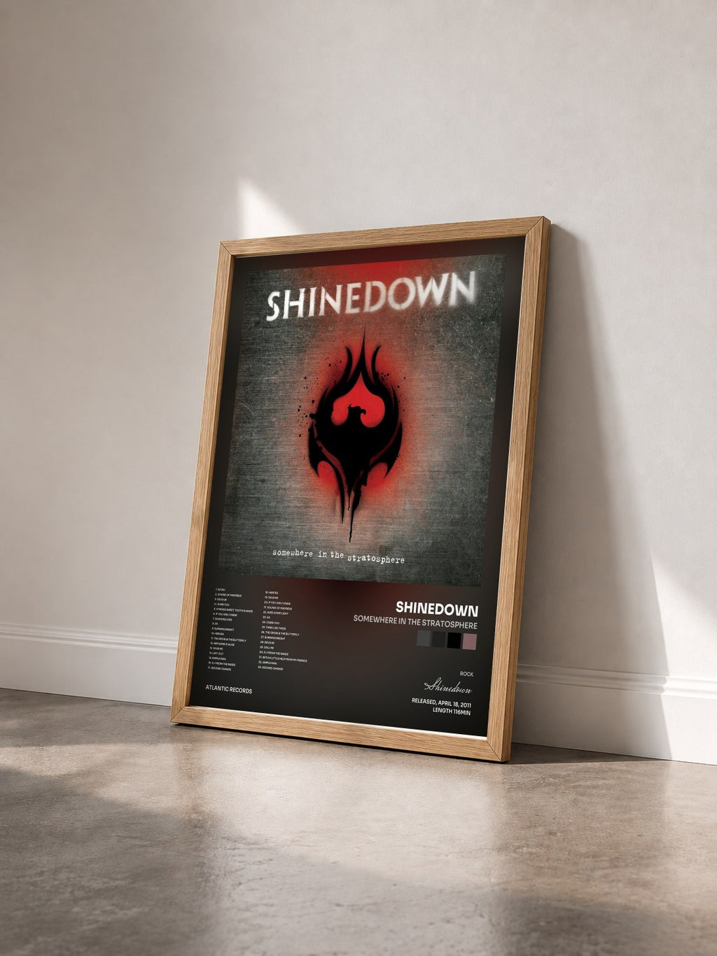 #bois Tableau de l'album Somewhere in the Stratosphere de Shinedown vu de trois quarts, cadre en bois brut