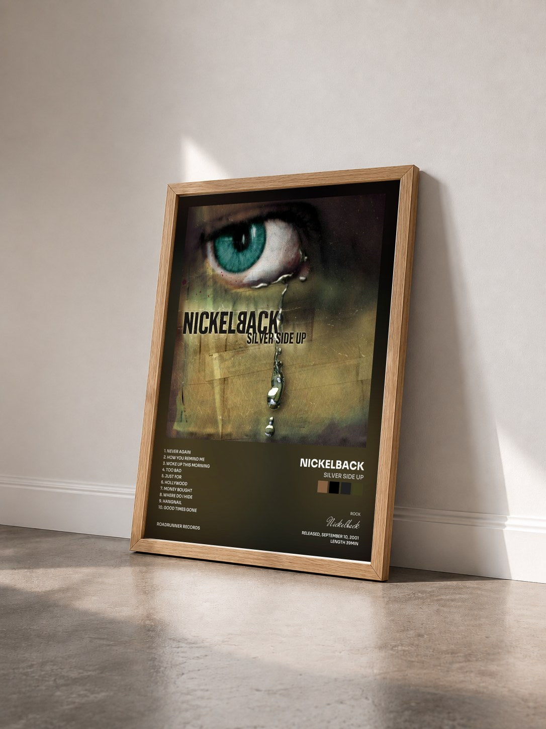 #bois Tableau de l'album Silver Side Up de Nickelback vu de trois quarts, cadre en bois brut