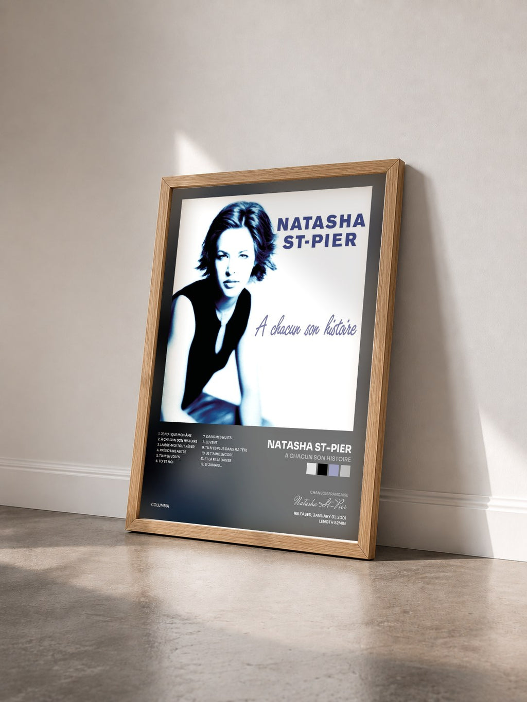 #bois Tableau de l'album A Chacun Son Histoire de Natasha St-Pier vu de trois quarts, cadre en bois brut
