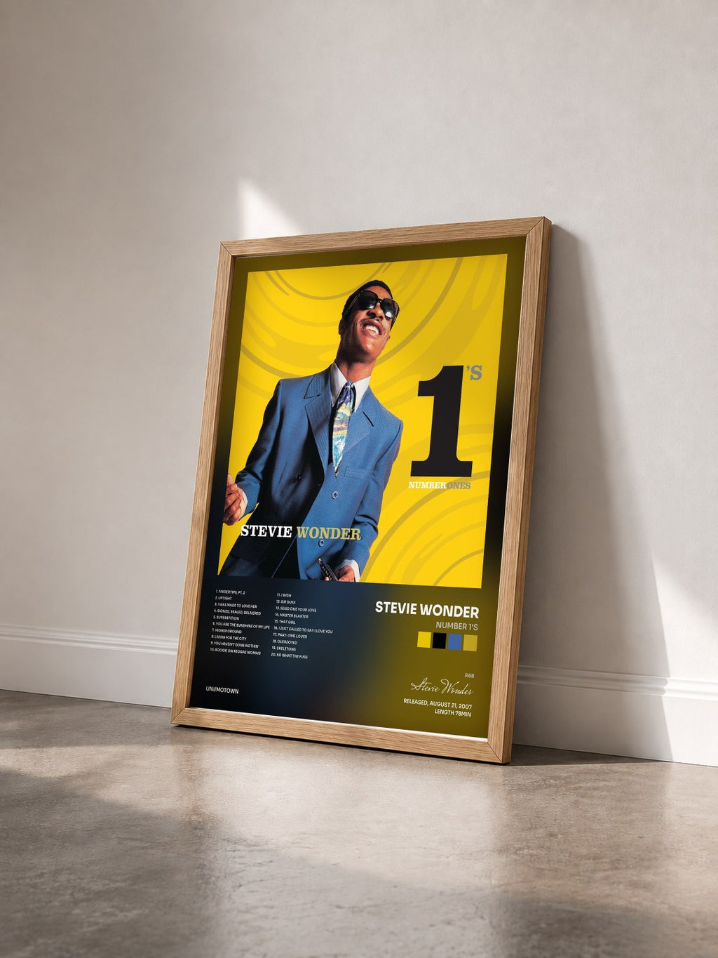#bois Tableau de l'album Number 1's de Stevie Wonder vu de trois quarts, cadre en bois brut