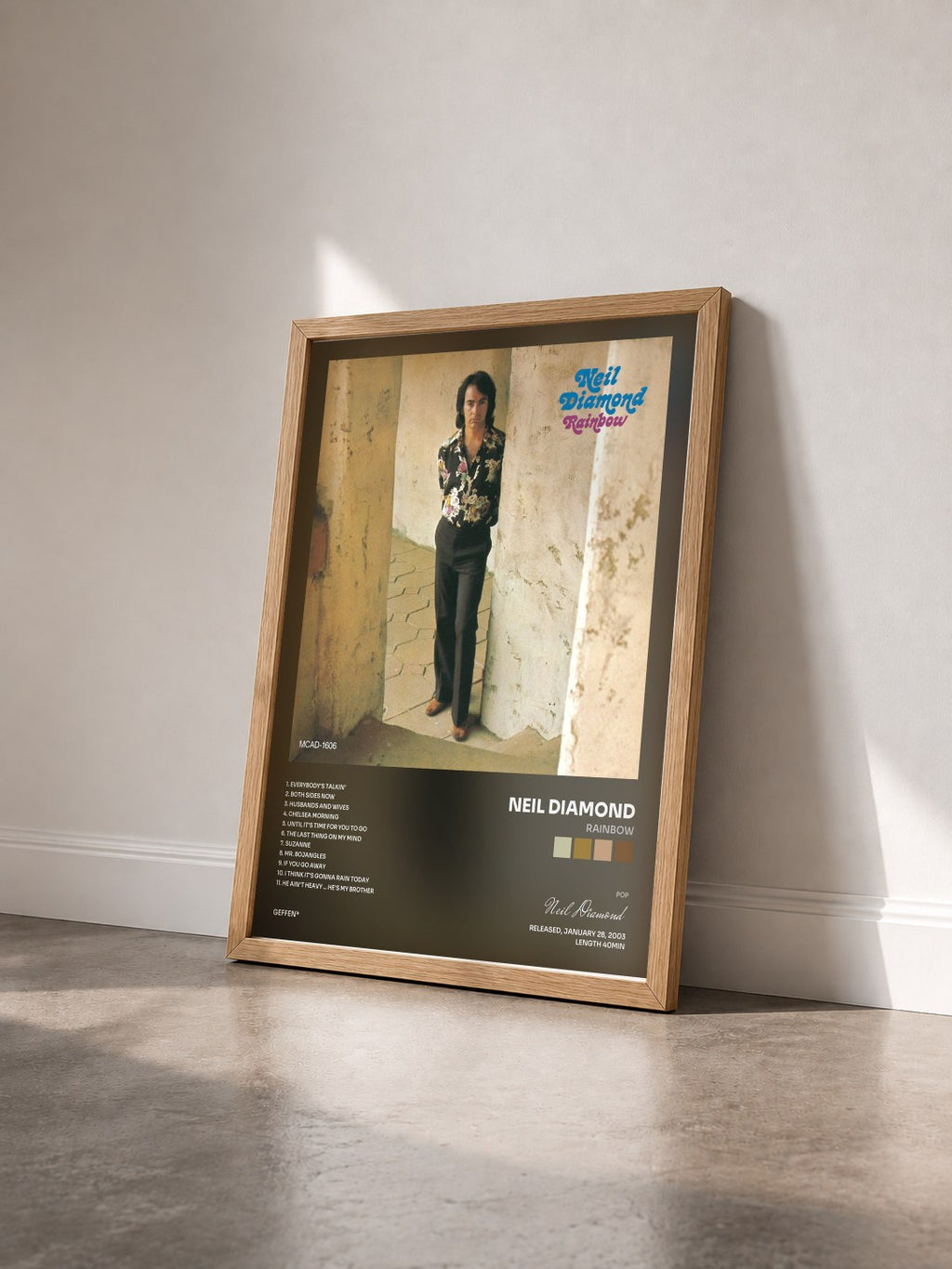 #bois Tableau de l'album Rainbow de Neil Diamond vu de trois quarts, cadre en bois brut