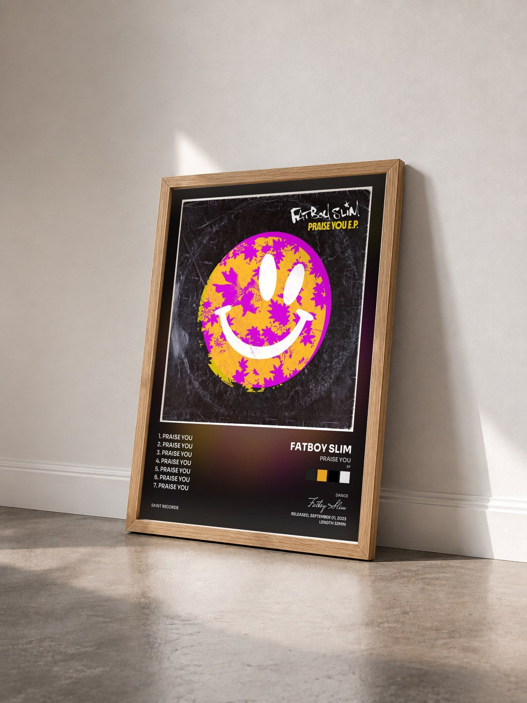 #bois Tableau de l'album Praise You (EP) de Fatboy Slim vu de trois quarts, cadre en bois brut