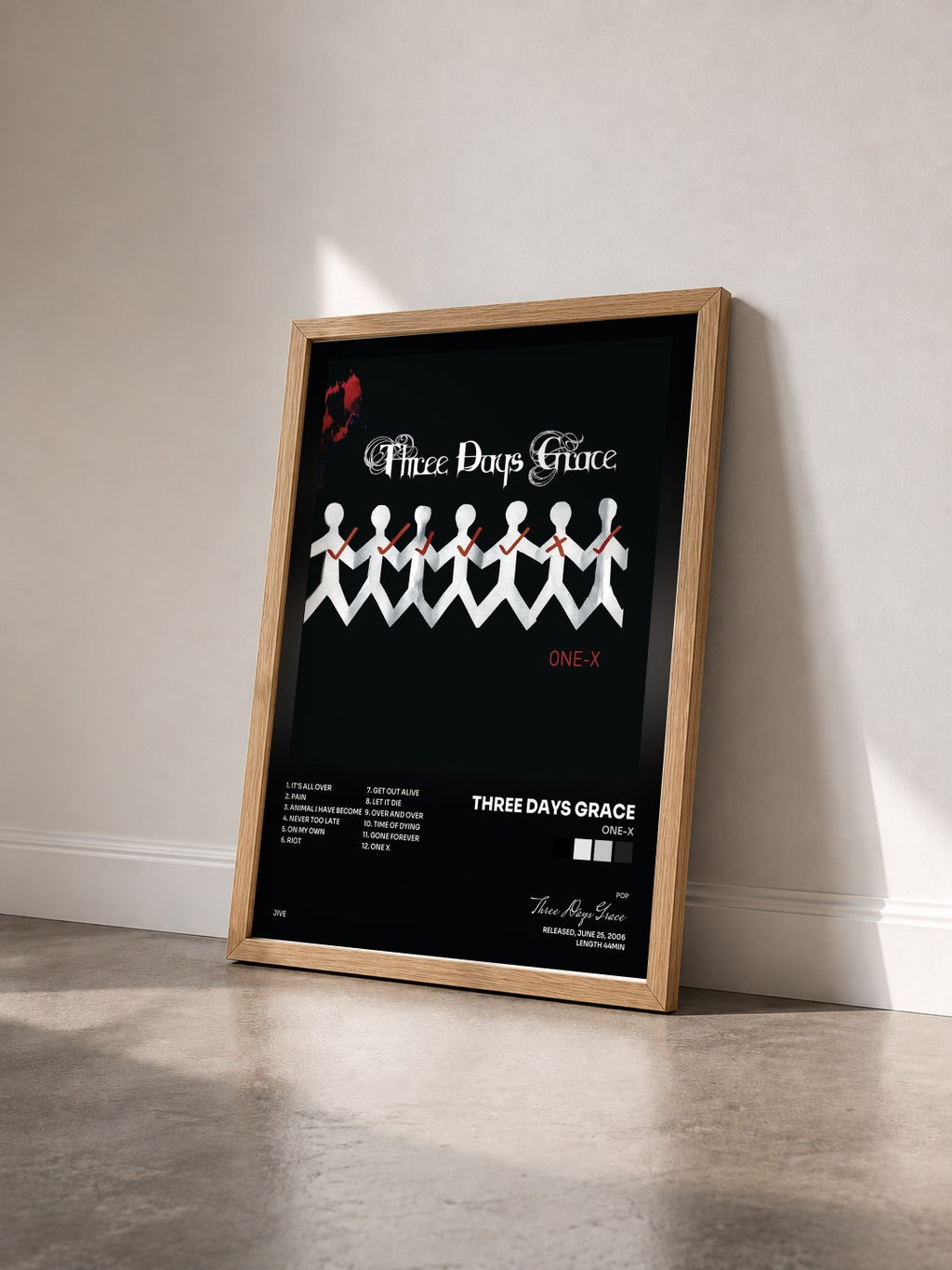 #bois Tableau de l'album One-X de Three Days Grace vu de trois quarts, cadre en bois brut