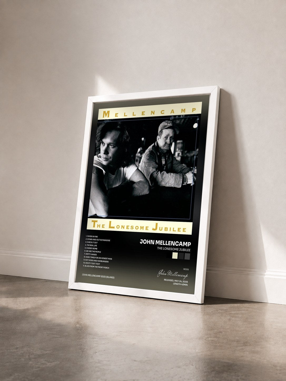 #blanc Tableau de l'album The Lonesome Jubilee de John Mellencamp vu de trois quarts, cadre blanc