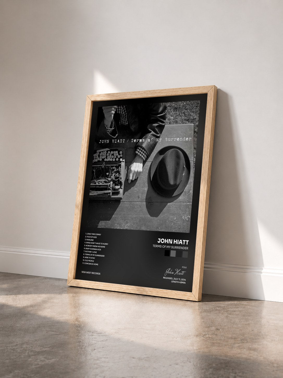 #bois Tableau de l'album Terms of My Surrender de John Hiatt vu de trois quarts, cadre en bois brut