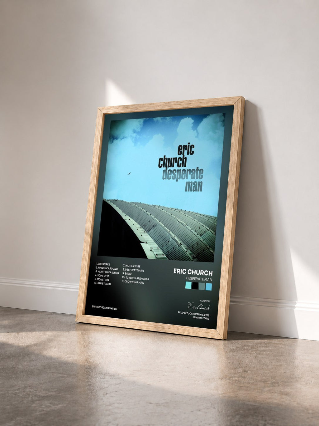 #bois Tableau de l'album Desperate Man de Eric Church vu de trois quarts, cadre en bois brut