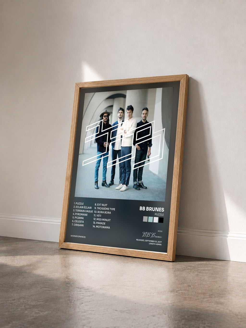 #bois Tableau de l'album Puzzle de BB Brunes vu de trois quarts, cadre en bois brut