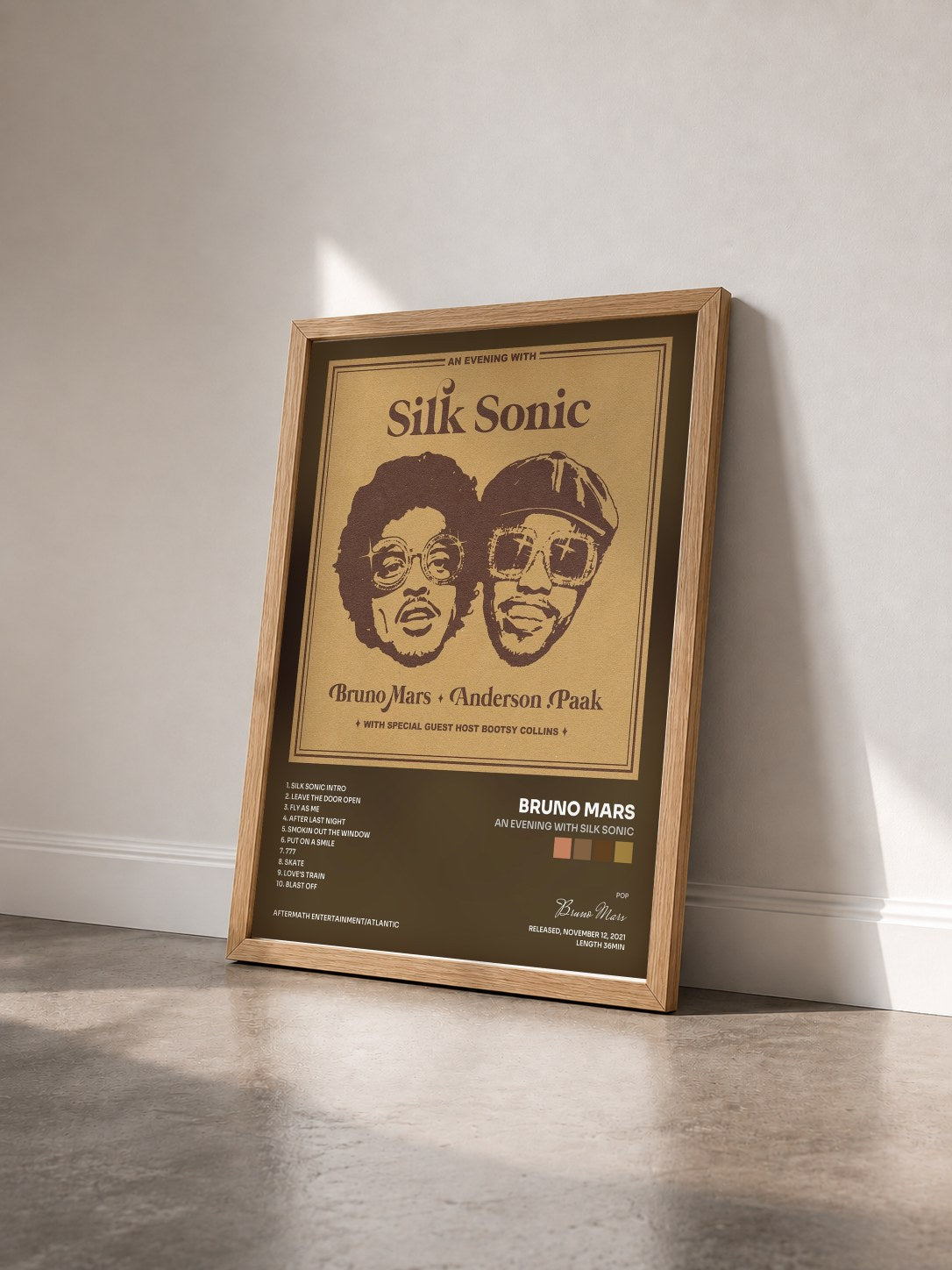 #bois Tableau de l'album An Evening With Silk Sonic de Bruno Mars vu de trois quarts, cadre en bois brut