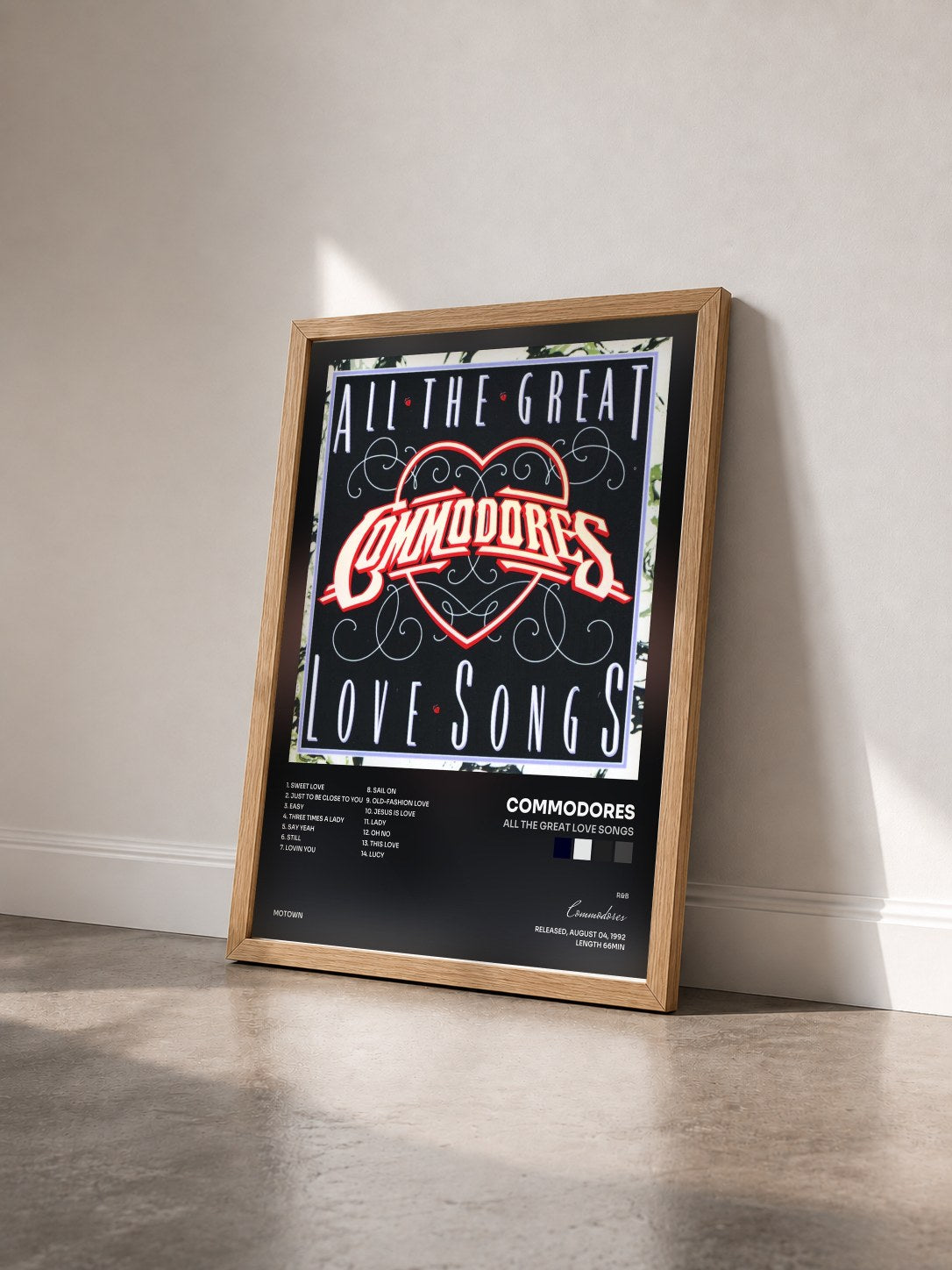 #bois Tableau de l'album All The Great Love Songs de Commodores vu de trois quarts, cadre en bois brut