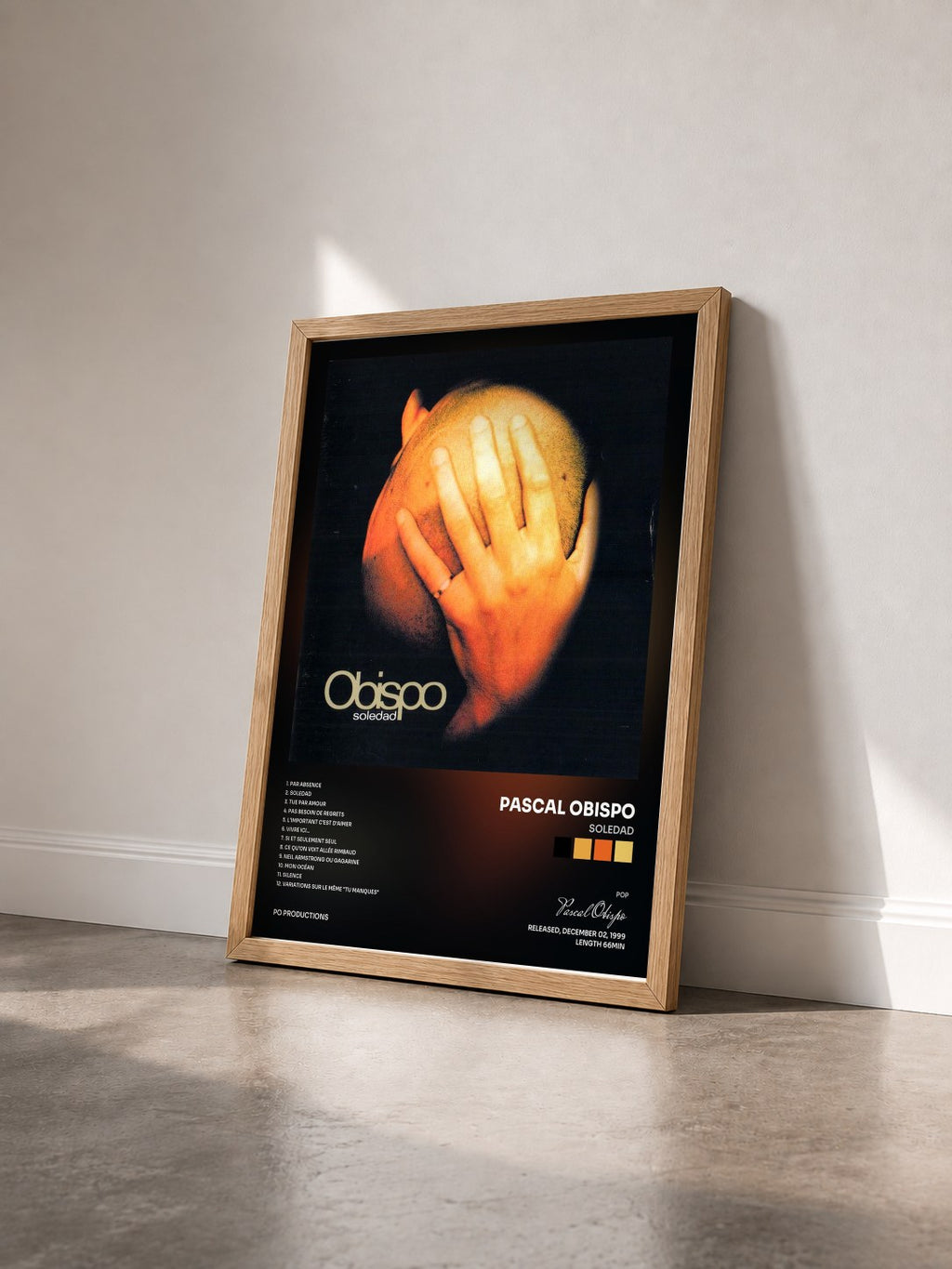 #bois Tableau de l'album Soledad de Pascal Obispo vu de trois quarts, cadre en bois brut