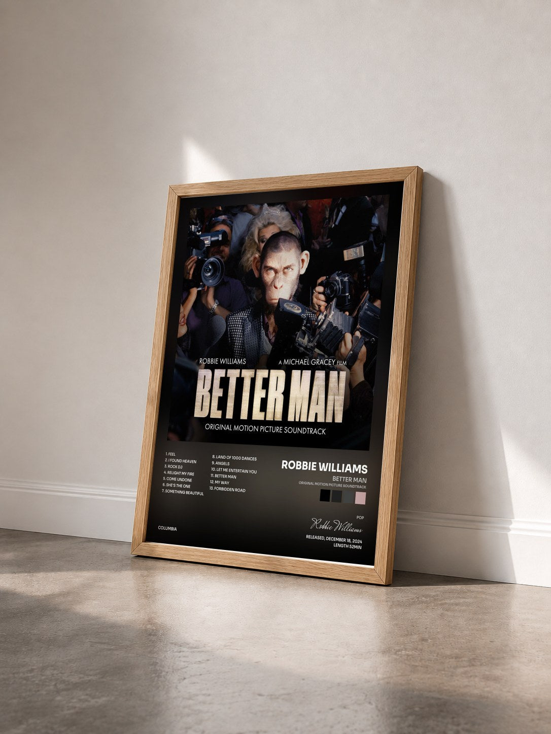 #bois Tableau de l'album Better Man (Original Motion Picture Soundtrack) de Robbie Williams vu de trois quarts, cadre en bois brut