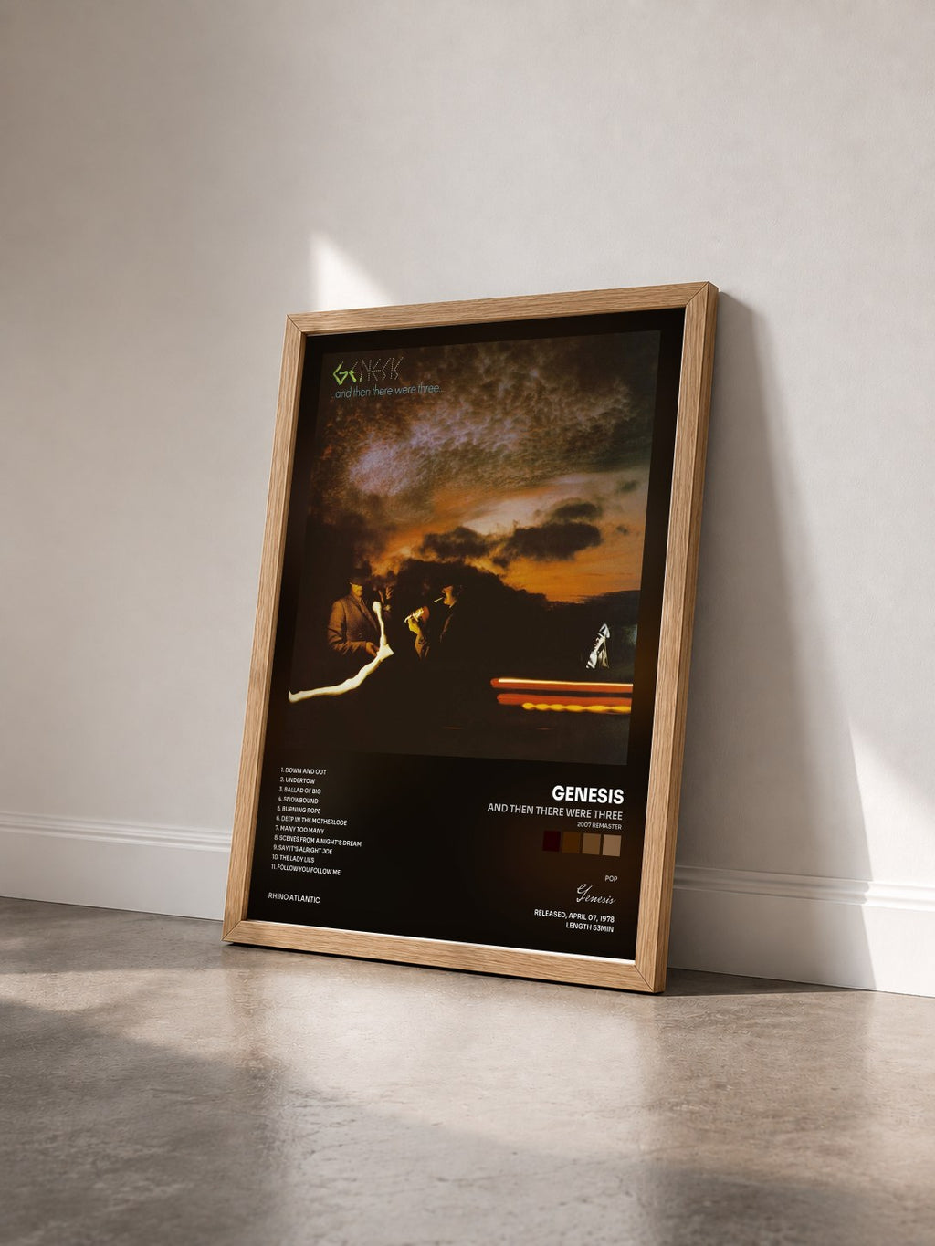 #bois Tableau de l'album And Then There Were Three (2007 Remaster) de Genesis vu de trois quarts, cadre en bois brut