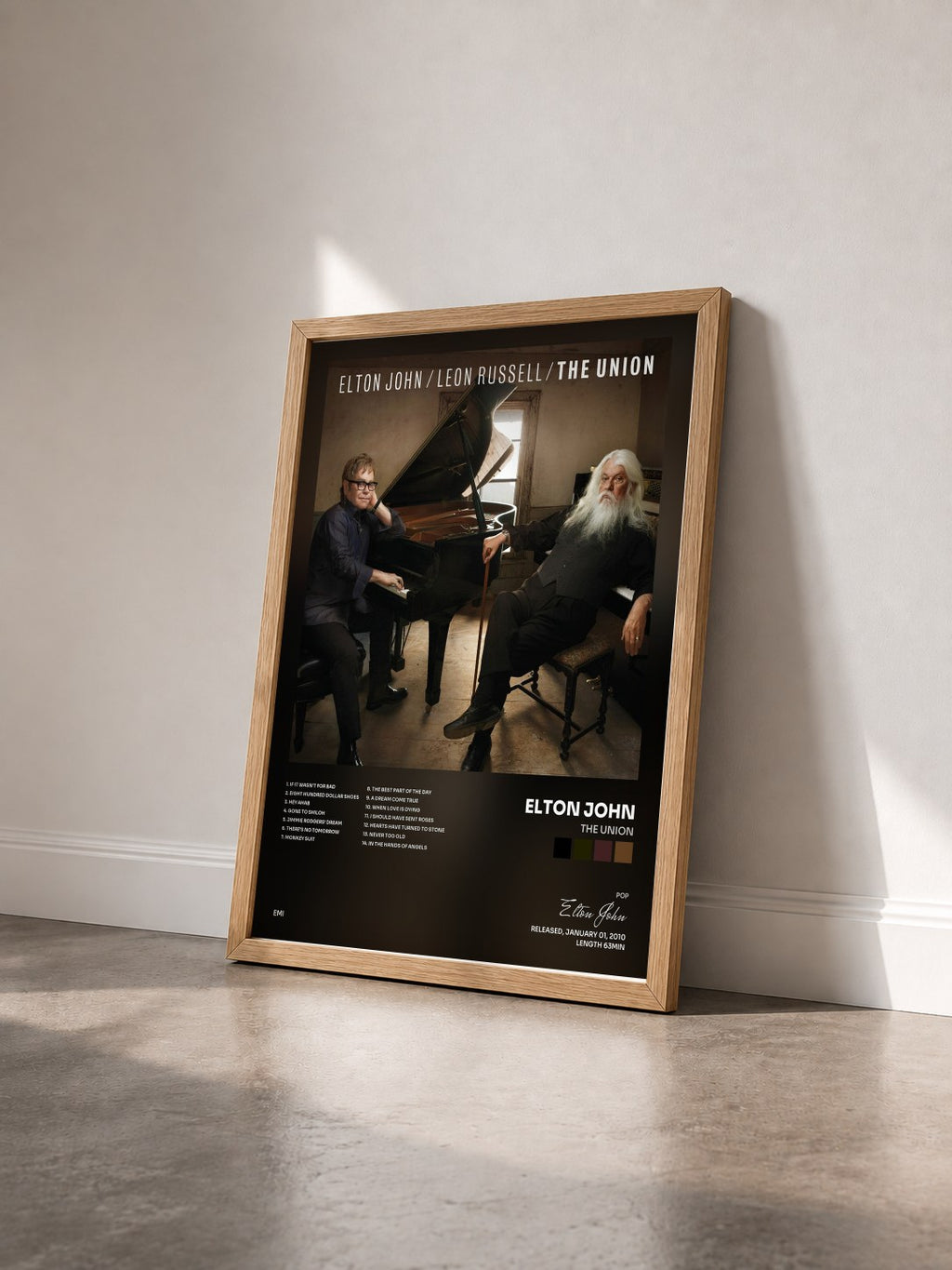 #bois Tableau de l'album The Union de Elton John vu de trois quarts, cadre en bois brut