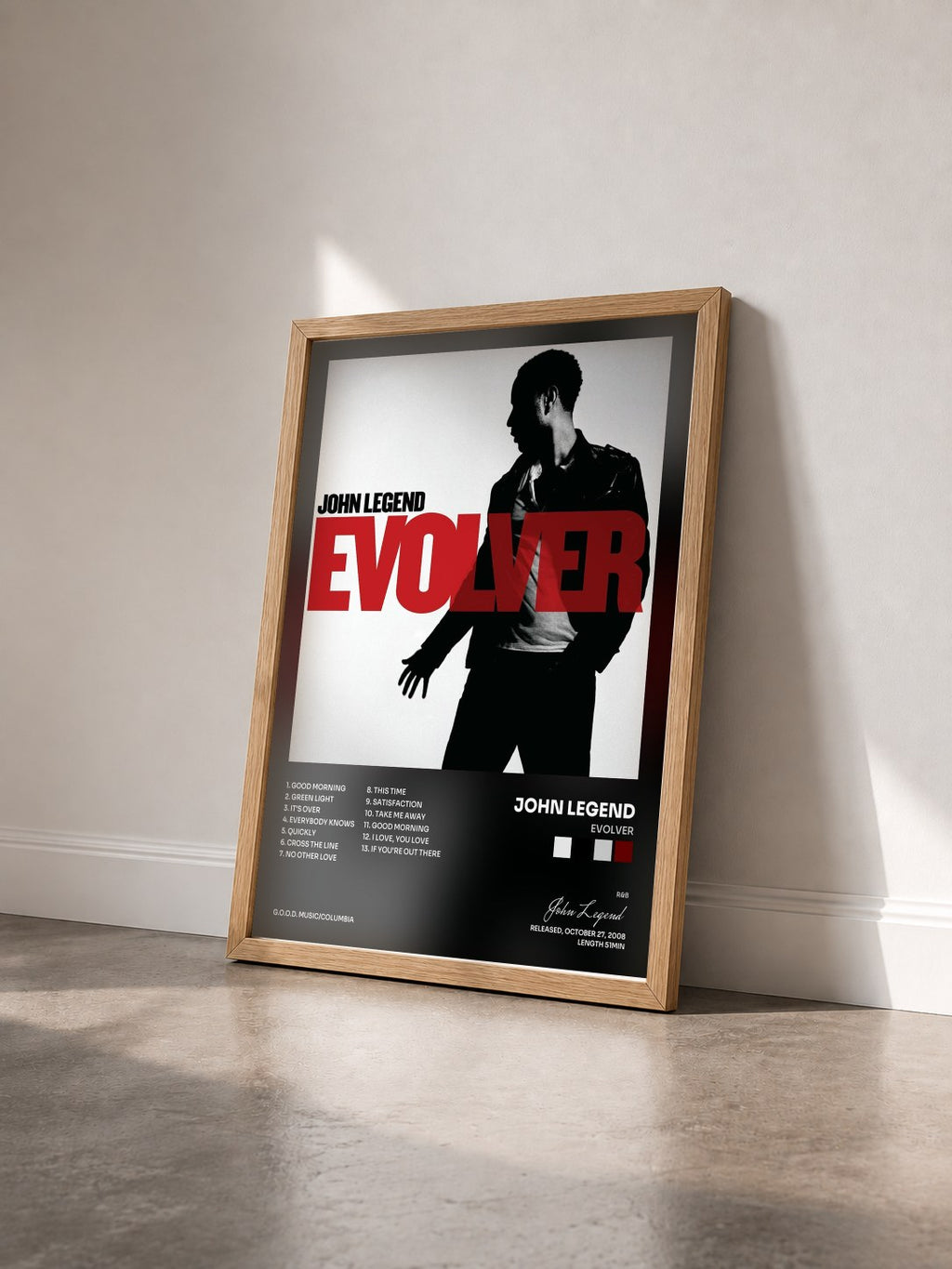 #bois Tableau de l'album Evolver de John Legend vu de trois quarts, cadre en bois brut