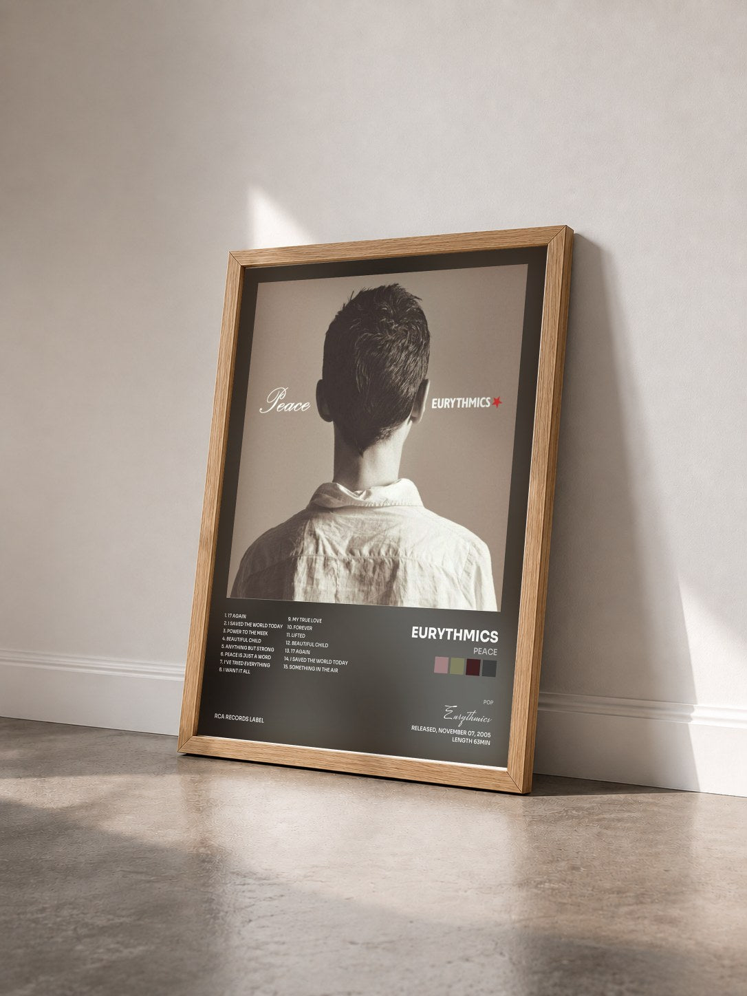 #bois Tableau de l'album Peace de Eurythmics vu de trois quarts, cadre en bois brut