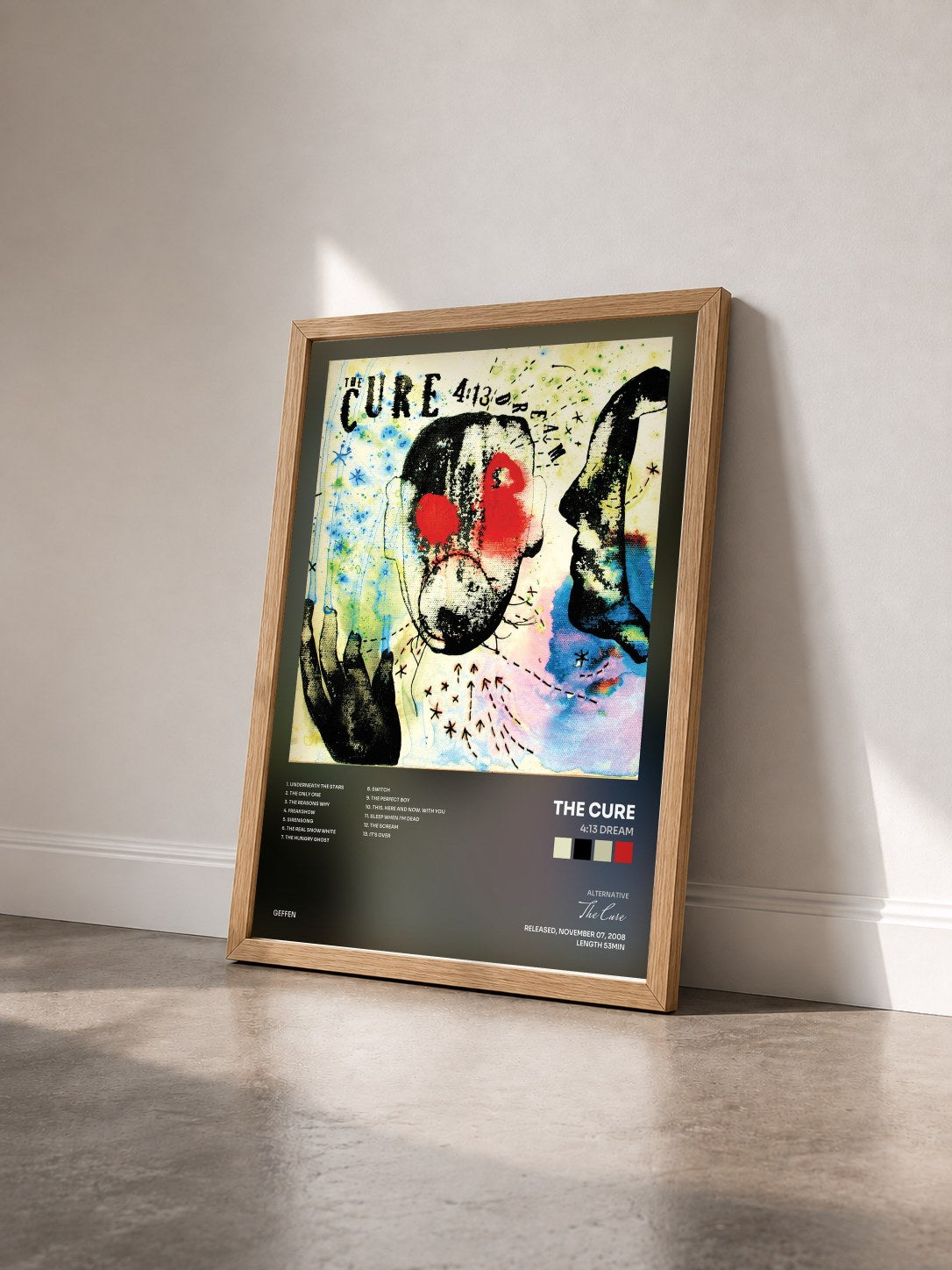 #bois Tableau de l'album 4:13 Dream de The Cure vu de trois quarts, cadre en bois brut