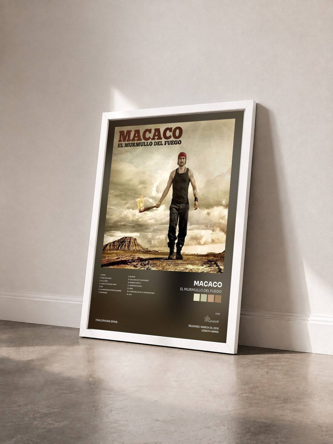 #blanc Tableau de l'album El Murmullo Del Fuego de Macaco vu de trois quarts, cadre blanc