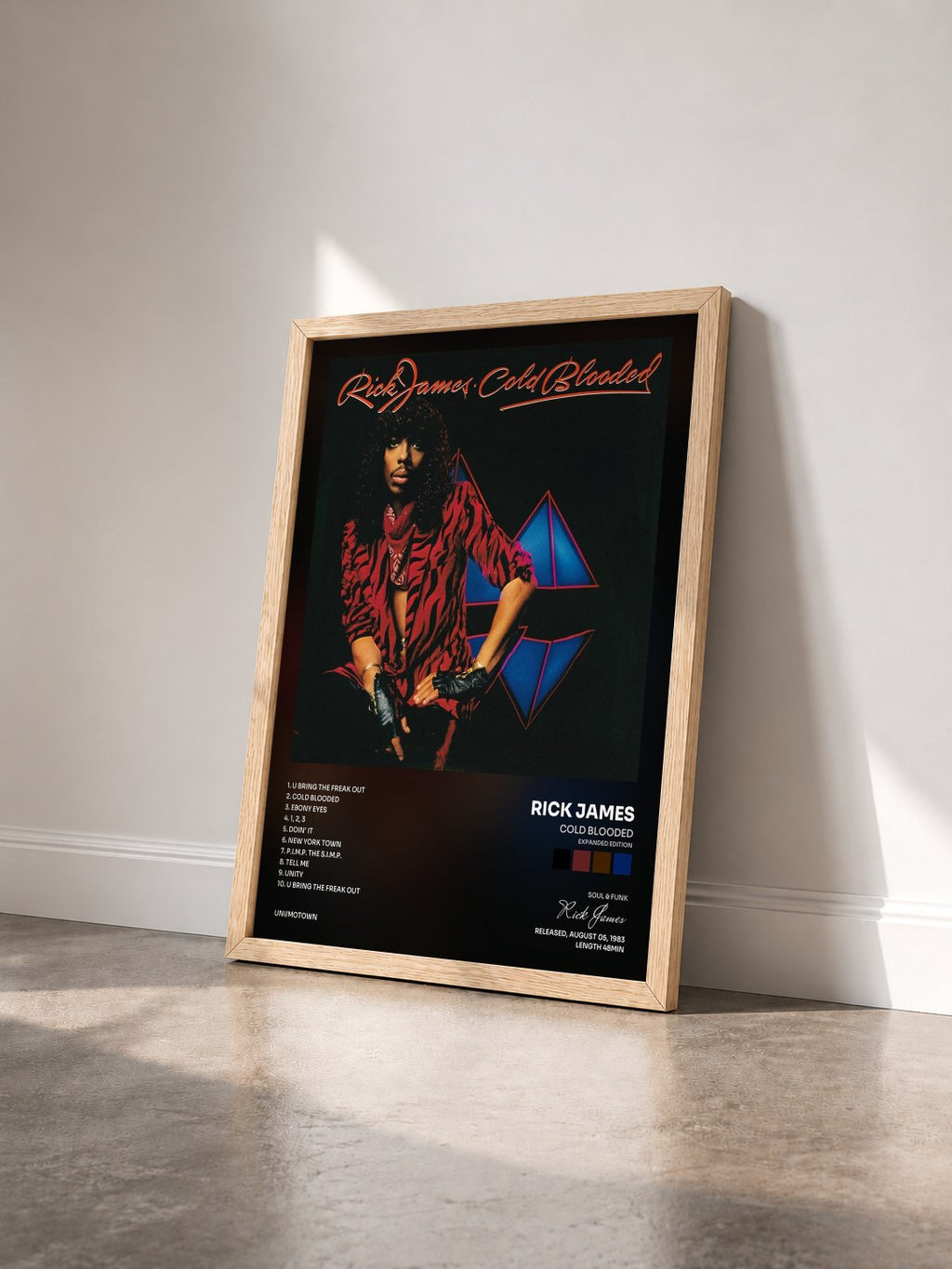 #bois Tableau de l'album Cold Blooded (Expanded Edition) de Rick James vu de trois quarts, cadre en bois brut