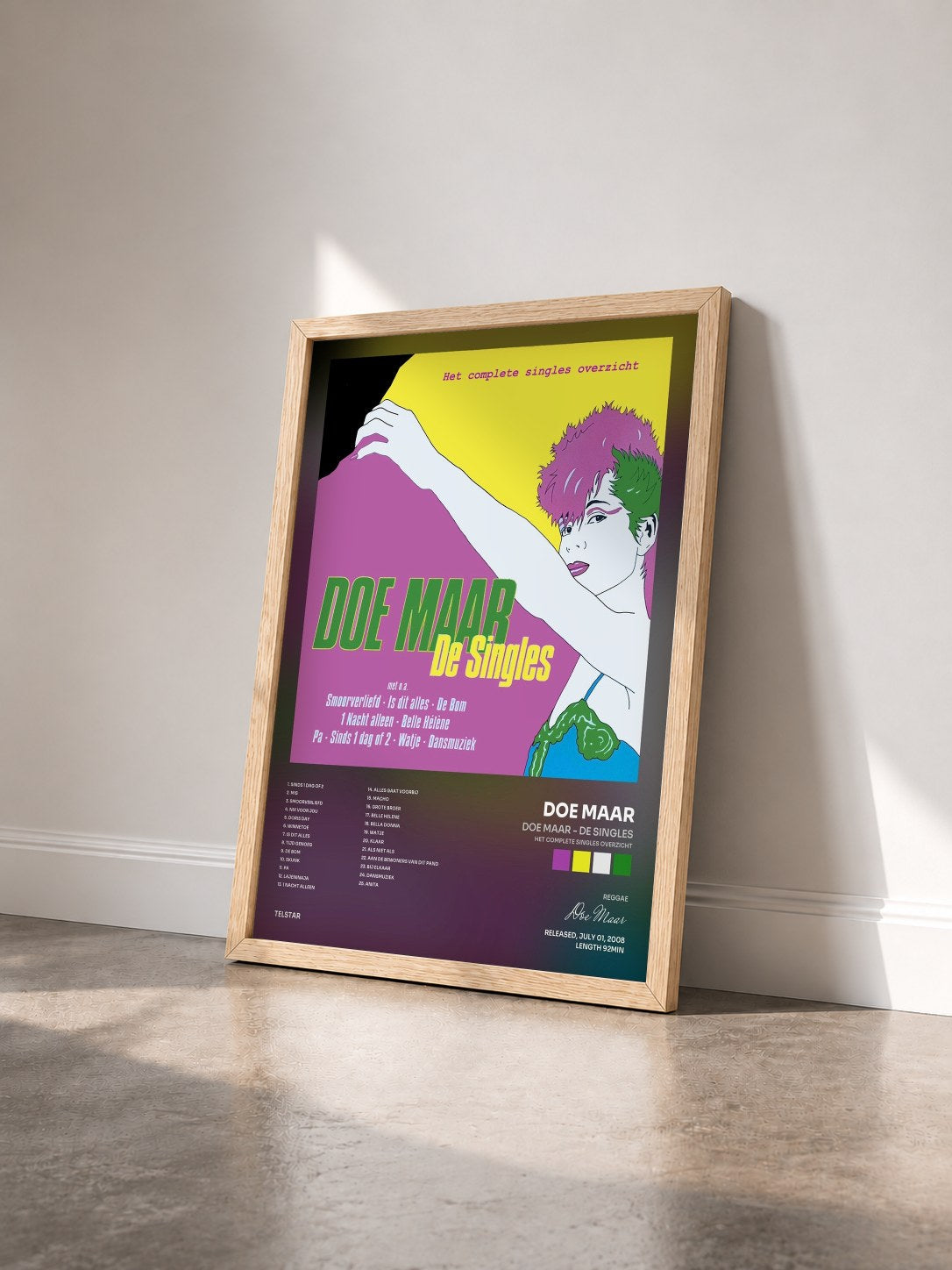 #bois Tableau de l'album Doe Maar - De Singles (Het Complete Singles Overzicht) de Doe Maar vu de trois quarts, cadre en bois brut