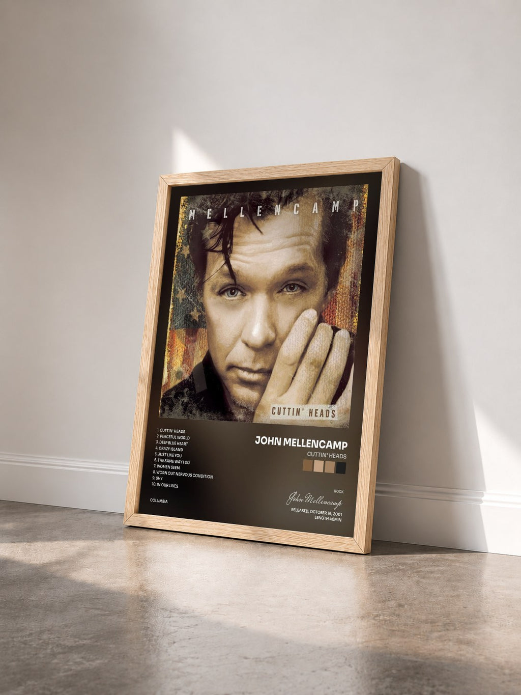 #bois Tableau de l'album Cuttin' Heads de John Mellencamp vu de trois quarts, cadre en bois brut