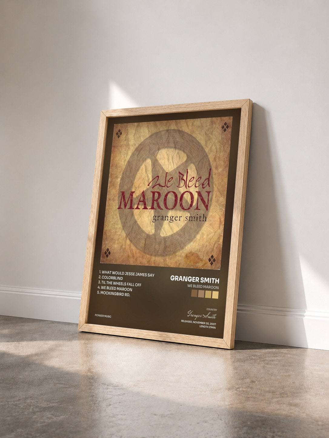 #bois Tableau de l'album We Bleed Maroon de Granger Smith vu de trois quarts, cadre en bois brut