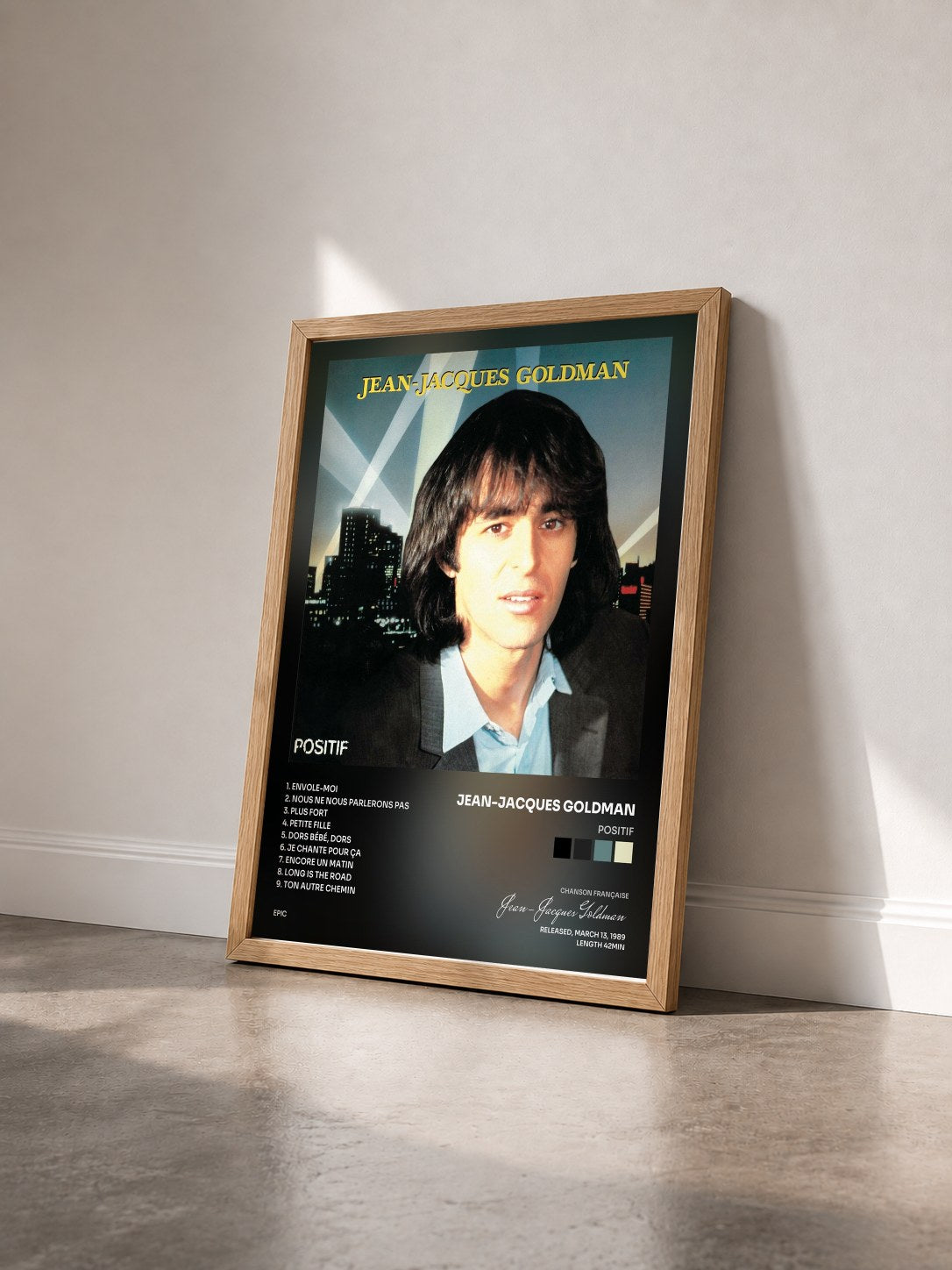 #bois Tableau de l'album Positif de Jean-Jacques Goldman vu de trois quarts, cadre en bois brut