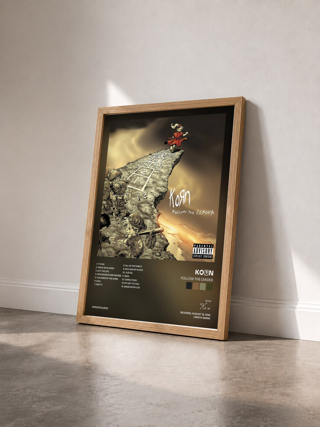 #bois Tableau de l'album Follow The Leader de KoЯn vu de trois quarts, cadre en bois brut