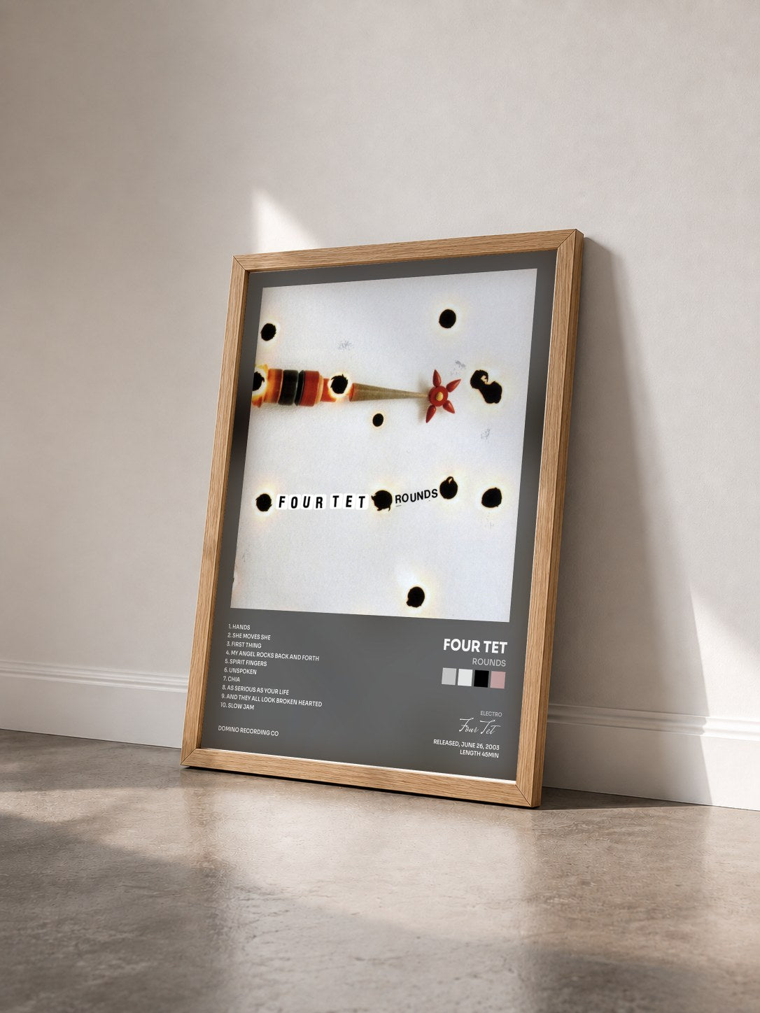 #bois Tableau de l'album Rounds de Four Tet vu de trois quarts, cadre en bois brut