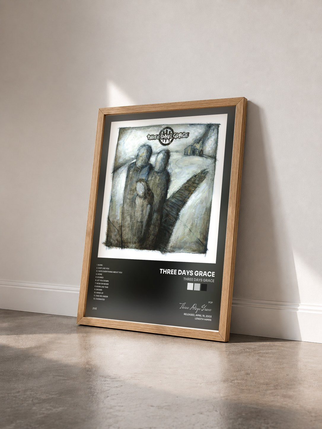 #bois Tableau de l'album Three Days Grace de Three Days Grace vu de trois quarts, cadre en bois brut