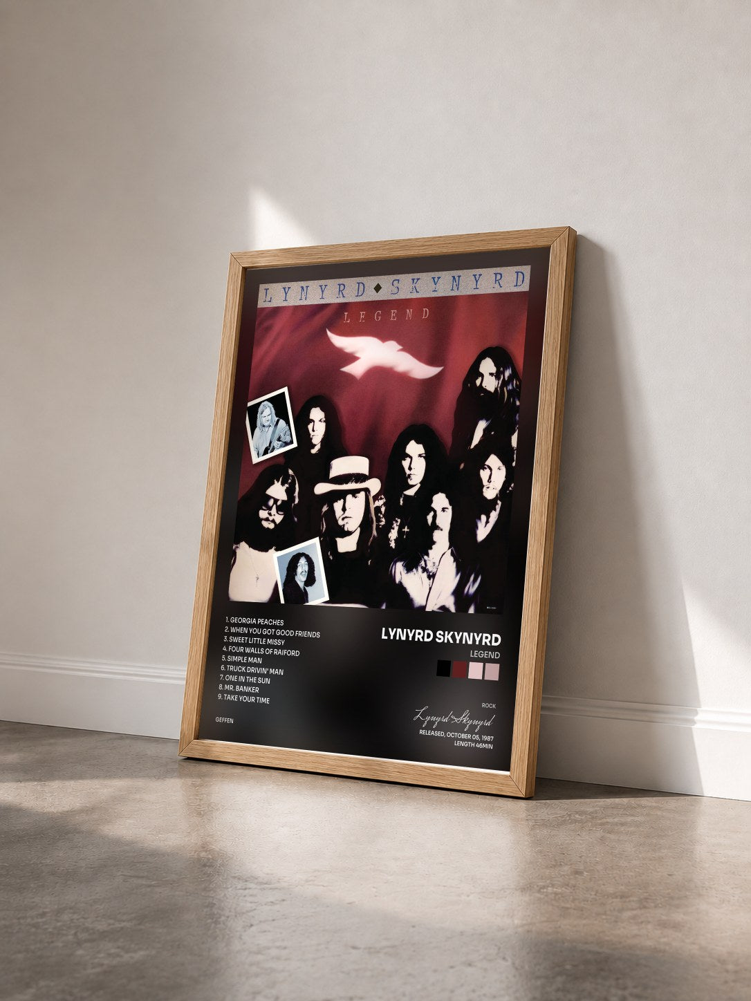 #bois Tableau de l'album Legend de Lynyrd Skynyrd vu de trois quarts, cadre en bois brut