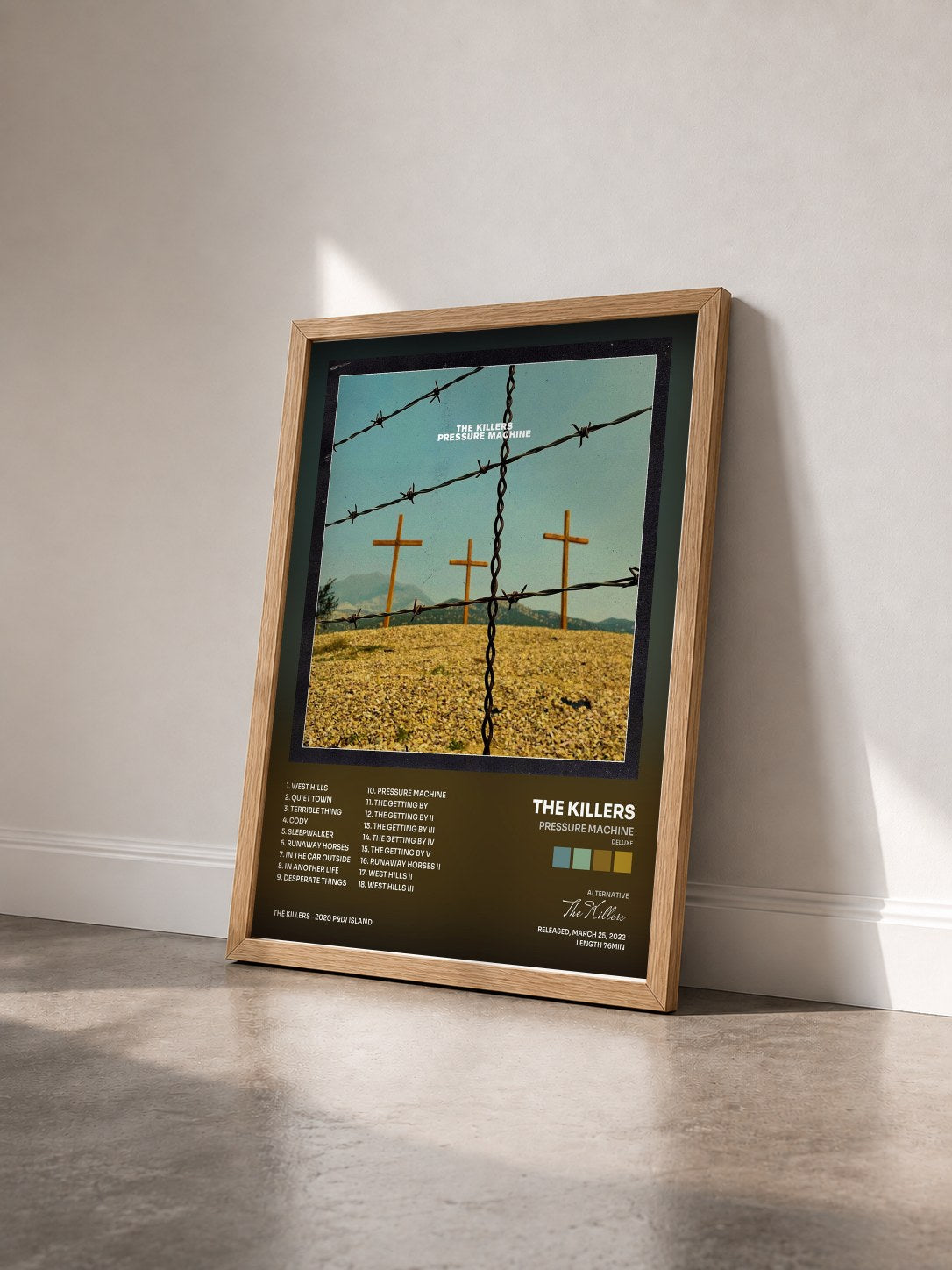 #bois Tableau de l'album Pressure Machine (Deluxe) de The Killers vu de trois quarts, cadre en bois brut