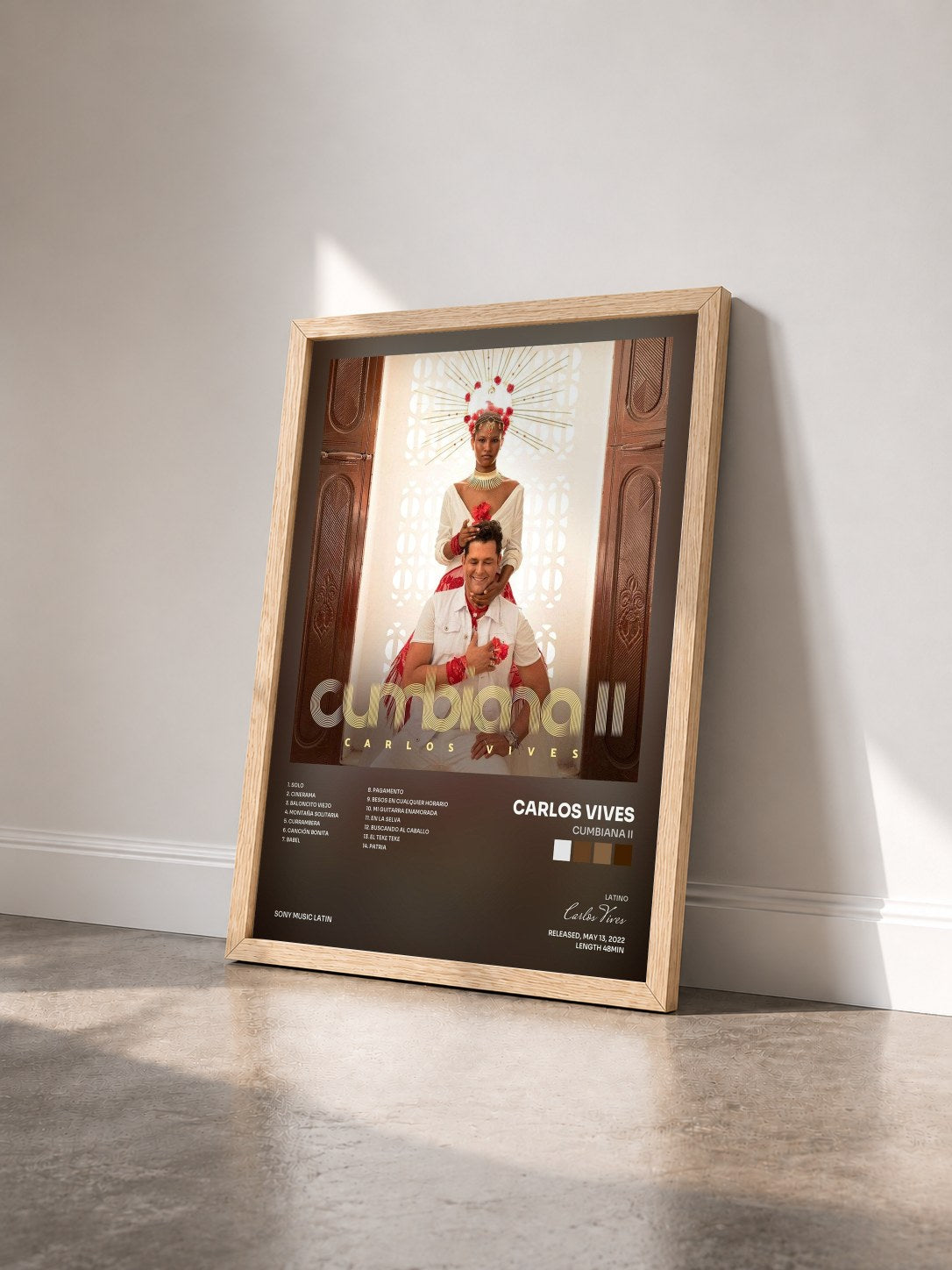 #bois Tableau de l'album Cumbiana II de Carlos Vives vu de trois quarts, cadre en bois brut