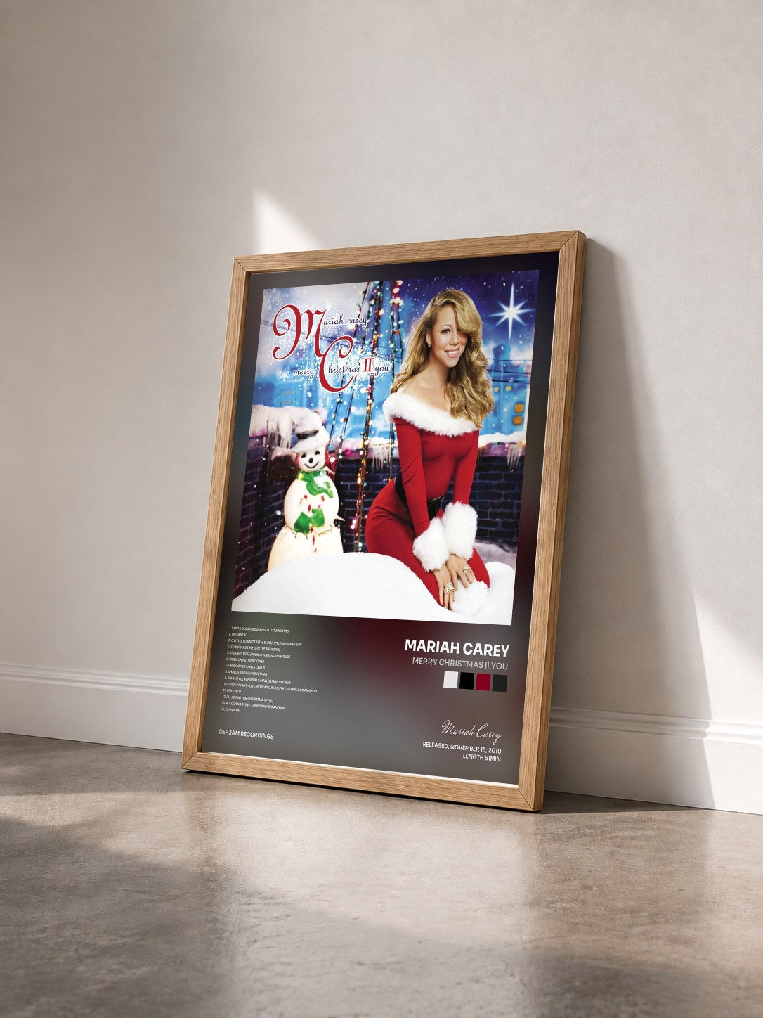 #bois Tableau de l'album Merry Christmas II You de Mariah Carey vu de trois quarts, cadre en bois brut