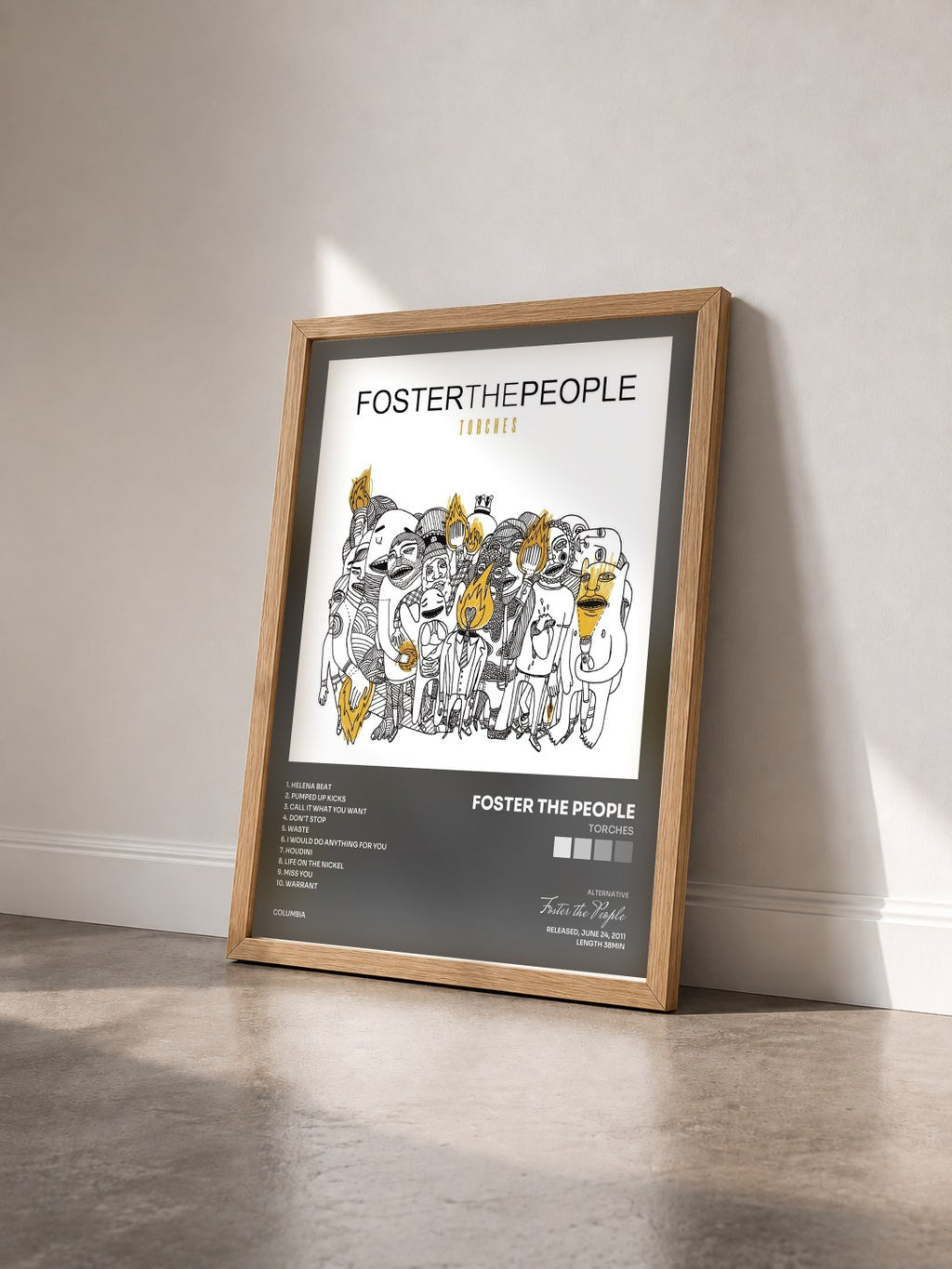 #bois Tableau de l'album Torches de Foster the People vu de trois quarts, cadre en bois brut