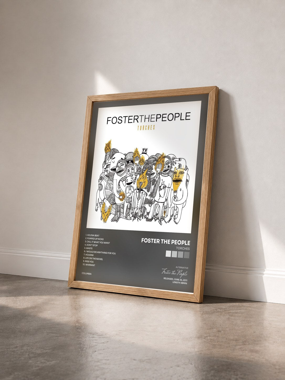 #bois Tableau de l'album Torches de Foster the People vu de trois quarts, cadre en bois brut