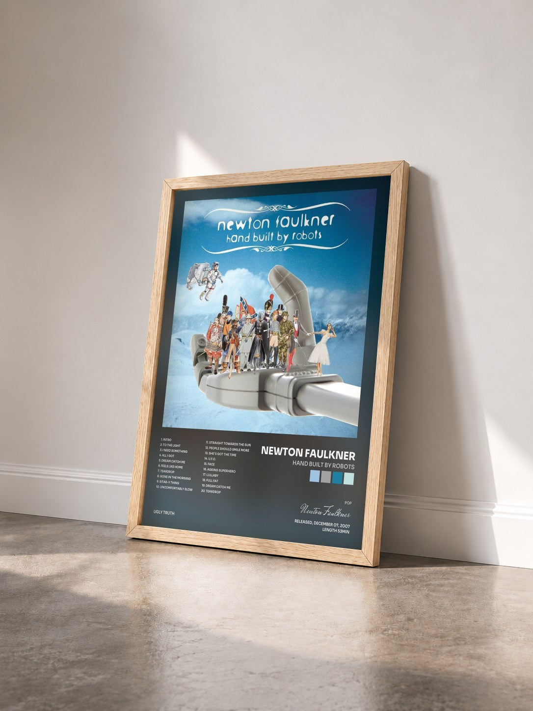 #bois Tableau de l'album Hand Built By Robots de Newton Faulkner vu de trois quarts, cadre en bois brut