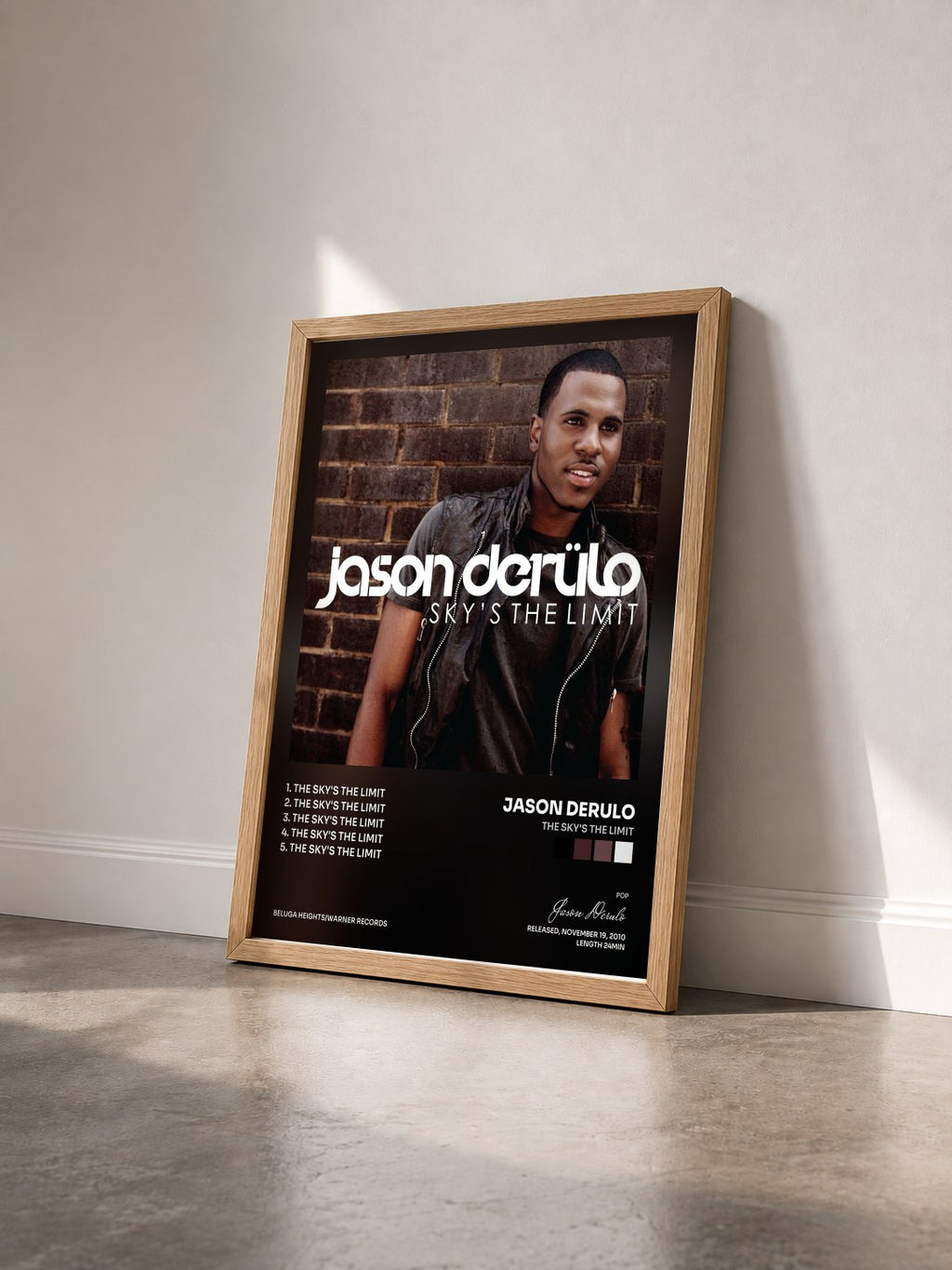 #bois Tableau de l'album The Sky's the Limit de Jason Derulo vu de trois quarts, cadre en bois brut