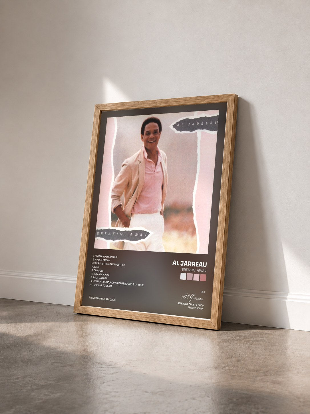 #bois Tableau de l'album Breakin' Away de Al Jarreau vu de trois quarts, cadre en bois brut